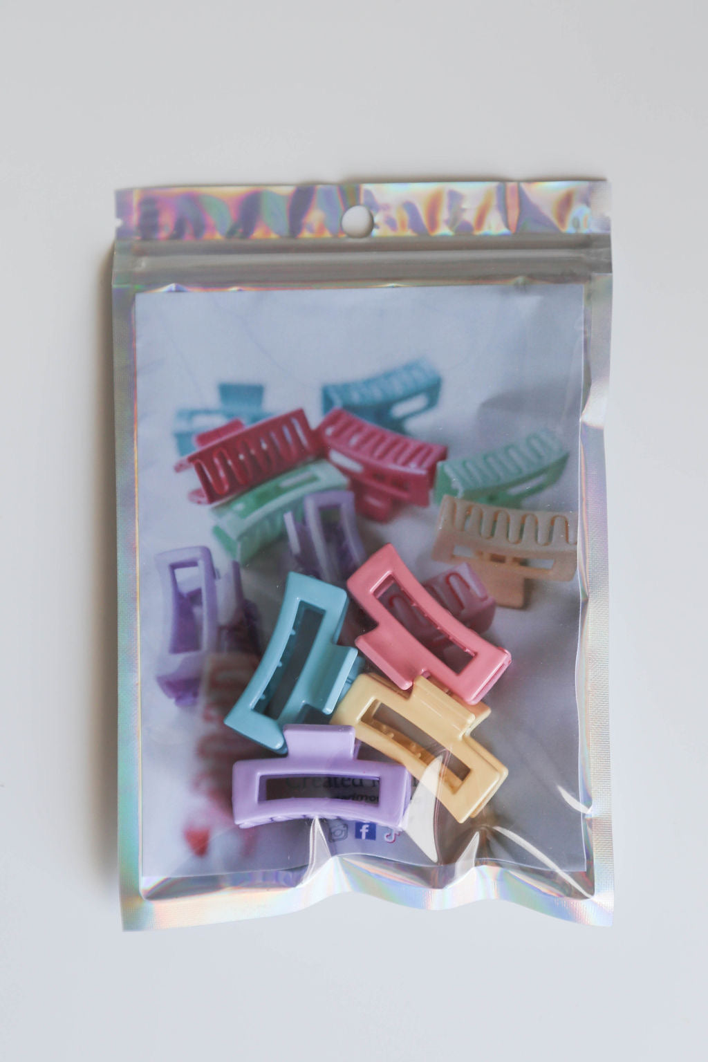 Set of 4 pastel micro hair claw clips, perfect for delicate hair styling.