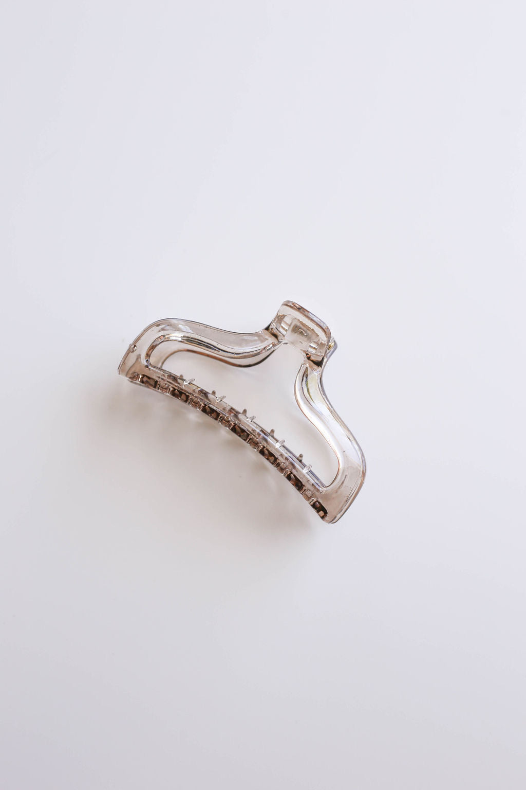 Vibrant and playful patterns in medium hair claw clips to suit every occasion.
