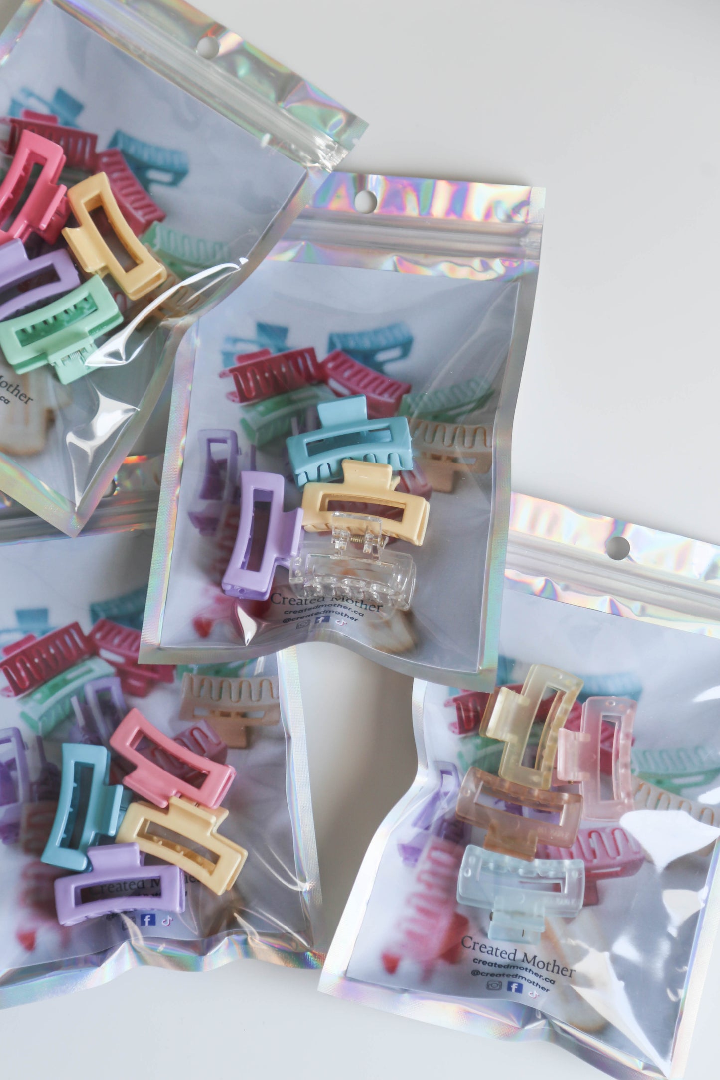 Durable plastic claw clips with a secure grip, ideal for managing small hair sections
