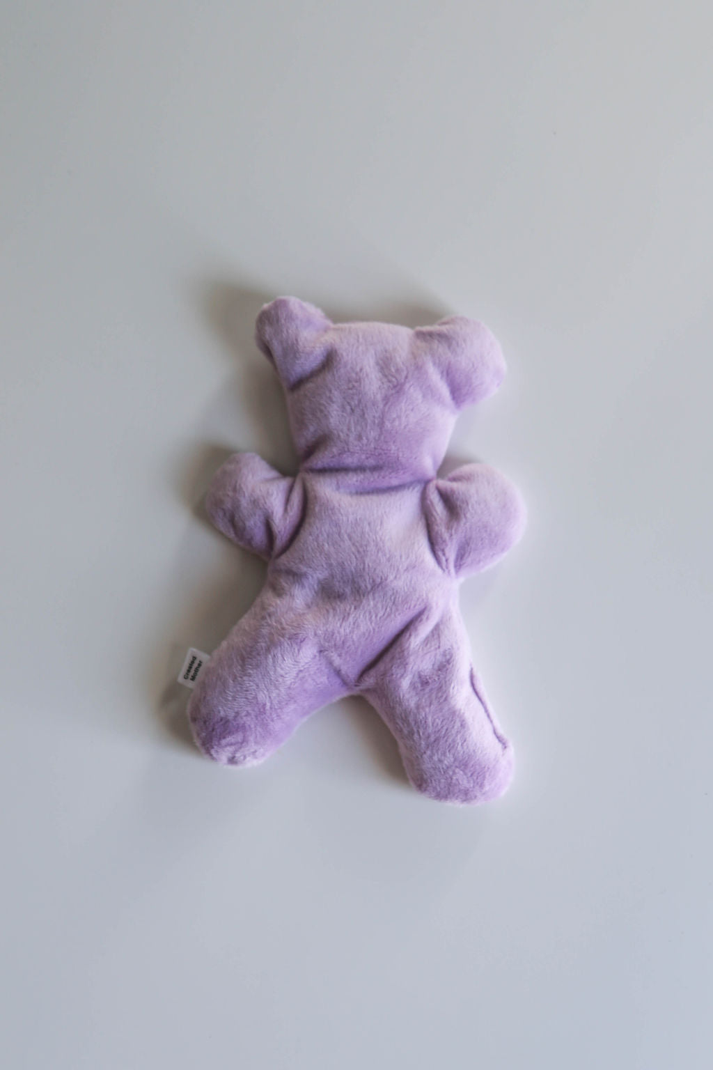 Purple bear to warm up or cool down for comfort