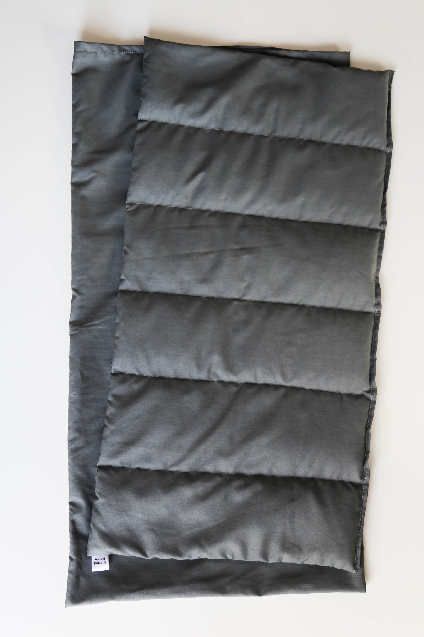 Grey extra large hot/cold pack crafted for adult use, great for tension, injuries, and large muscle areas.
