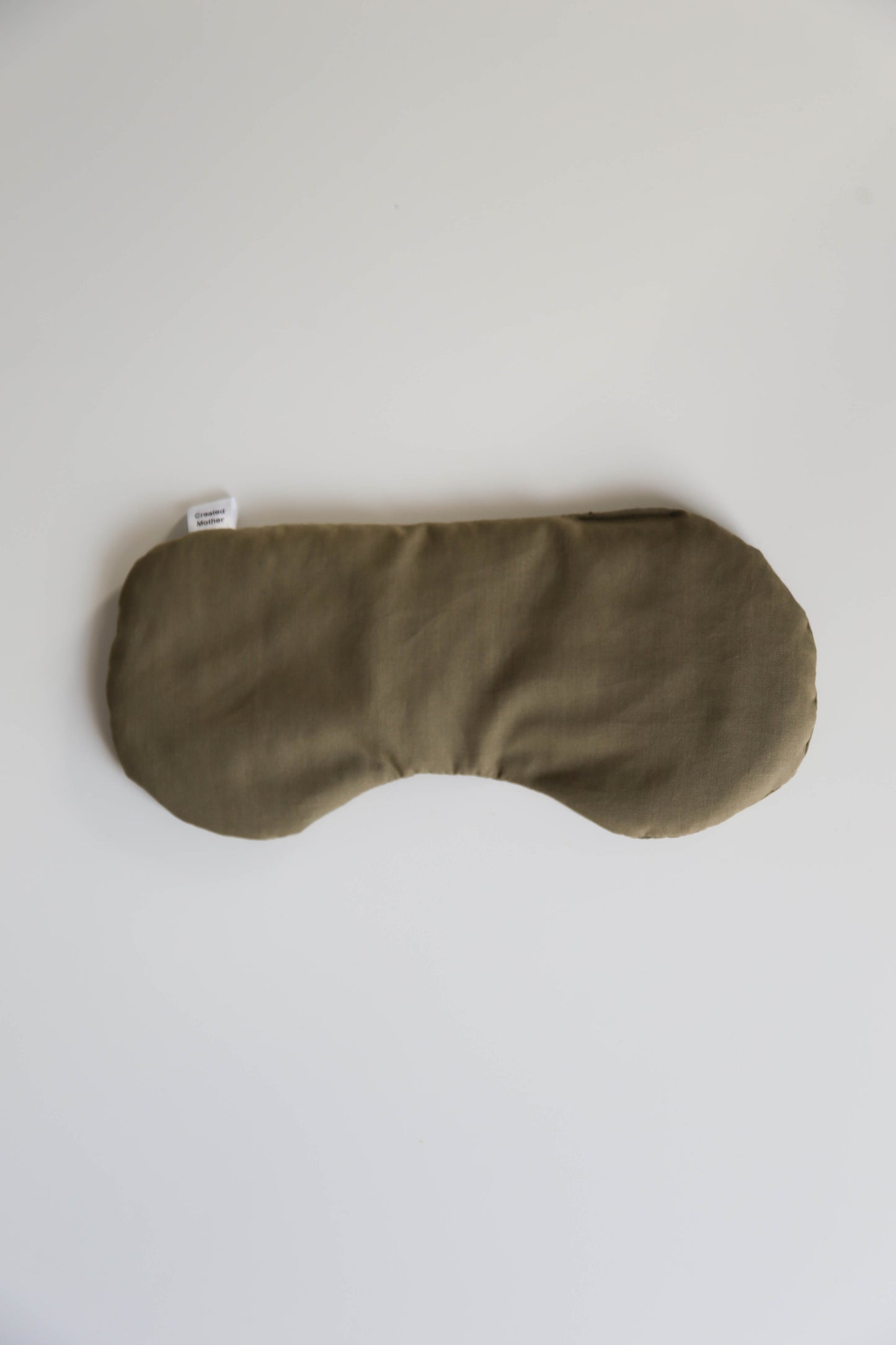 Multipurpose eye mask therapy pack suited for use on eyes, temples, or forehead to relieve tension and pain.