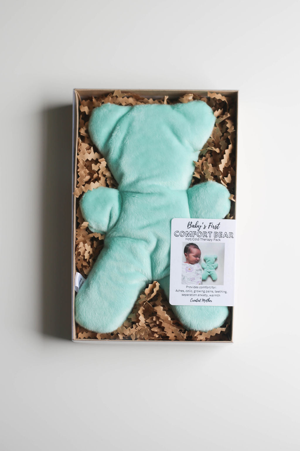 Reusable hot/cold bear pack packaged for gifting—perfect for baby showers and new parents.