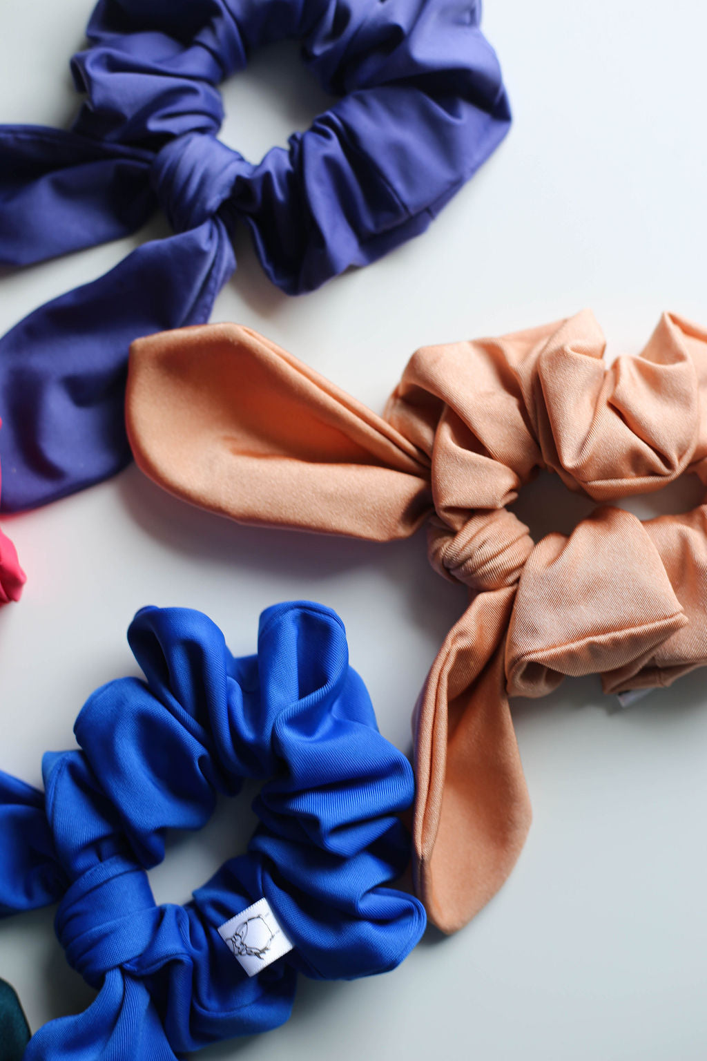 Colourful scrunchies ideal for hiking, running, and swimming