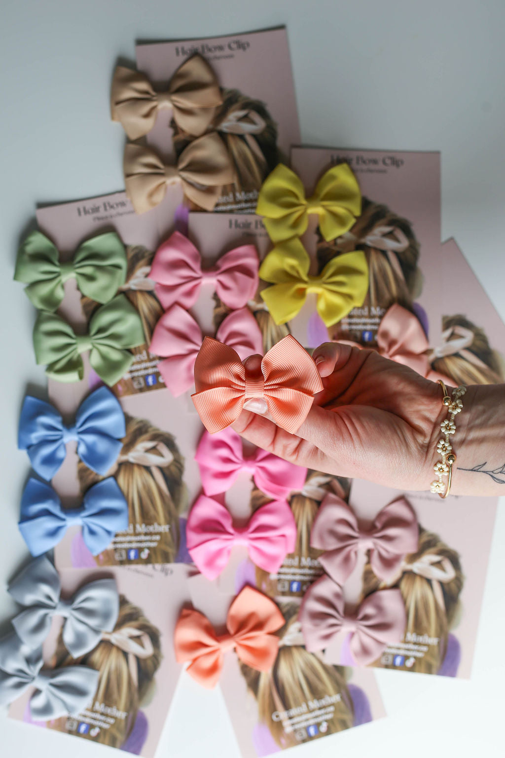 Elegant ribbon bow hair accessory with strong alligator clip for secure all-day hold.