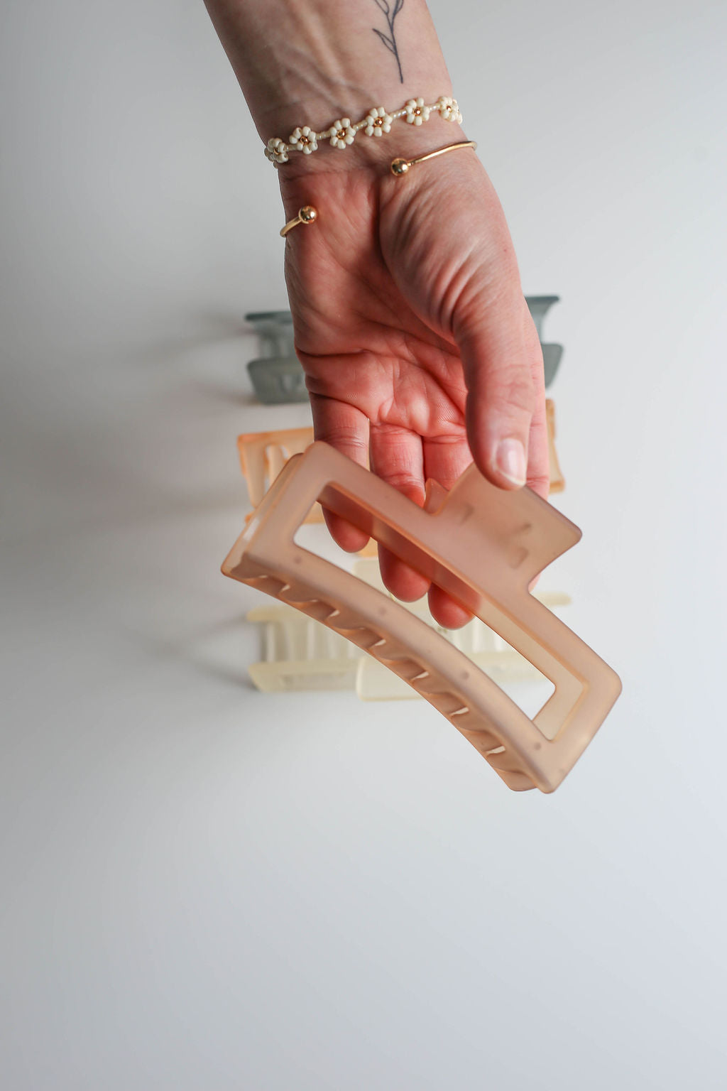 Large hair claw clip offering a smooth, kink-free hold without tight elastics.