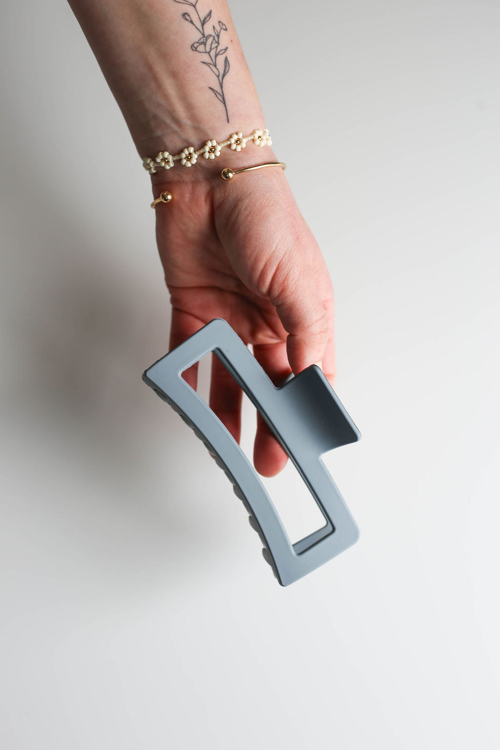 Large hair clip engineered for easy one-handed use and quick styling on the go.