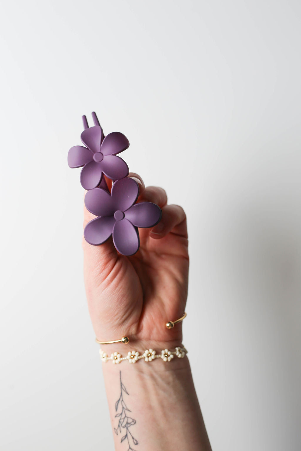 Matte purple lay flat flower claw clip for comfortable everyday hairstyles