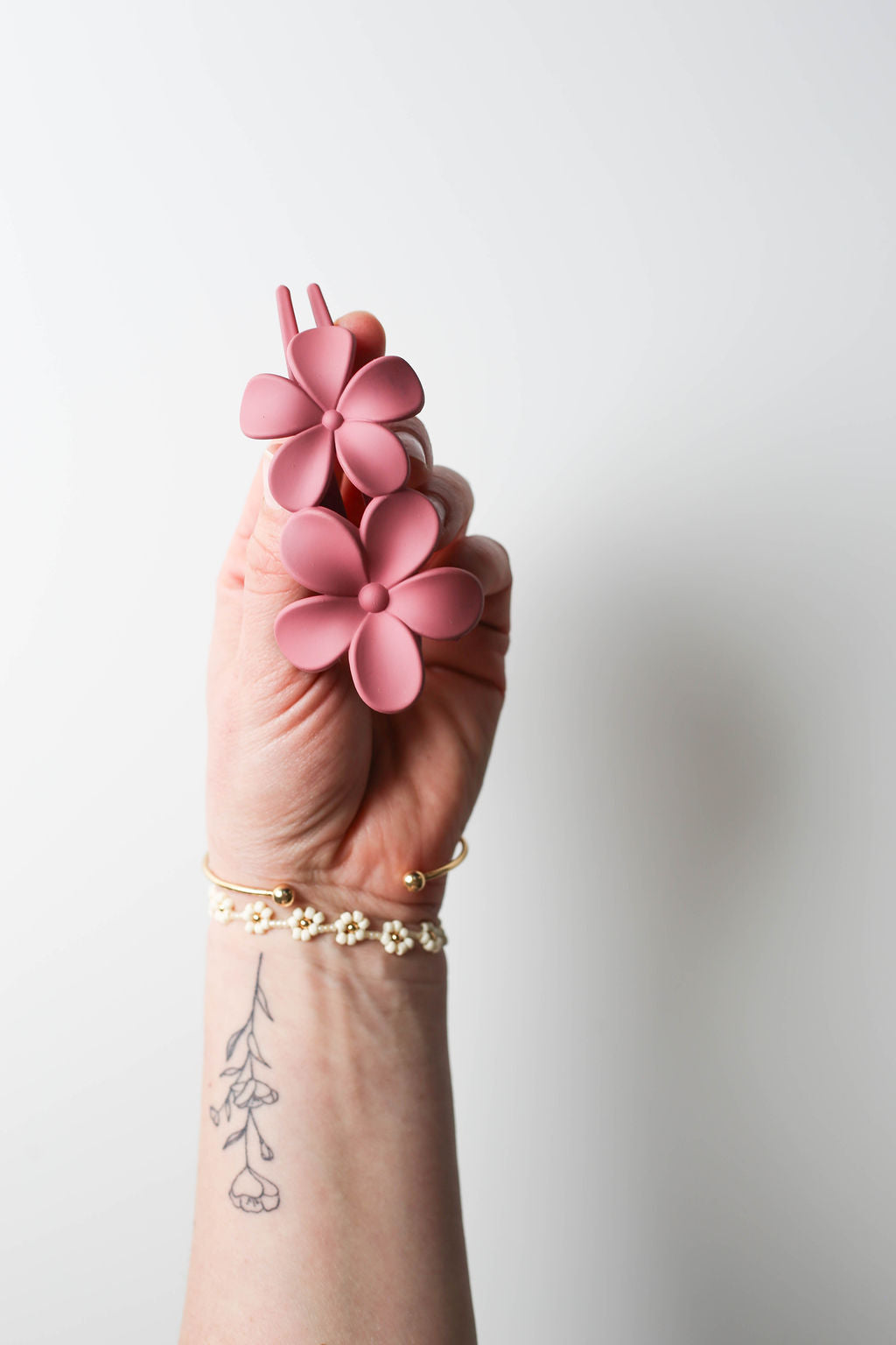 Rose pink flat floral claw clip for secure, stylish hair on the go