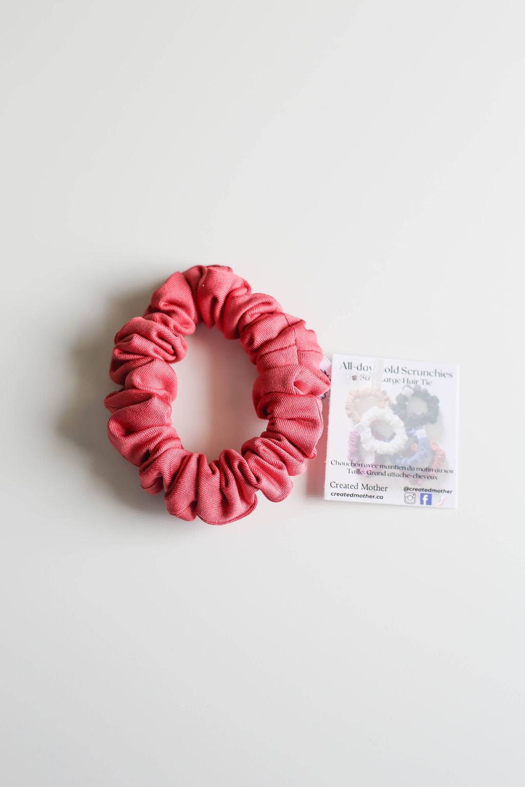 Quick-drying coral scrunchie perfect for pool use