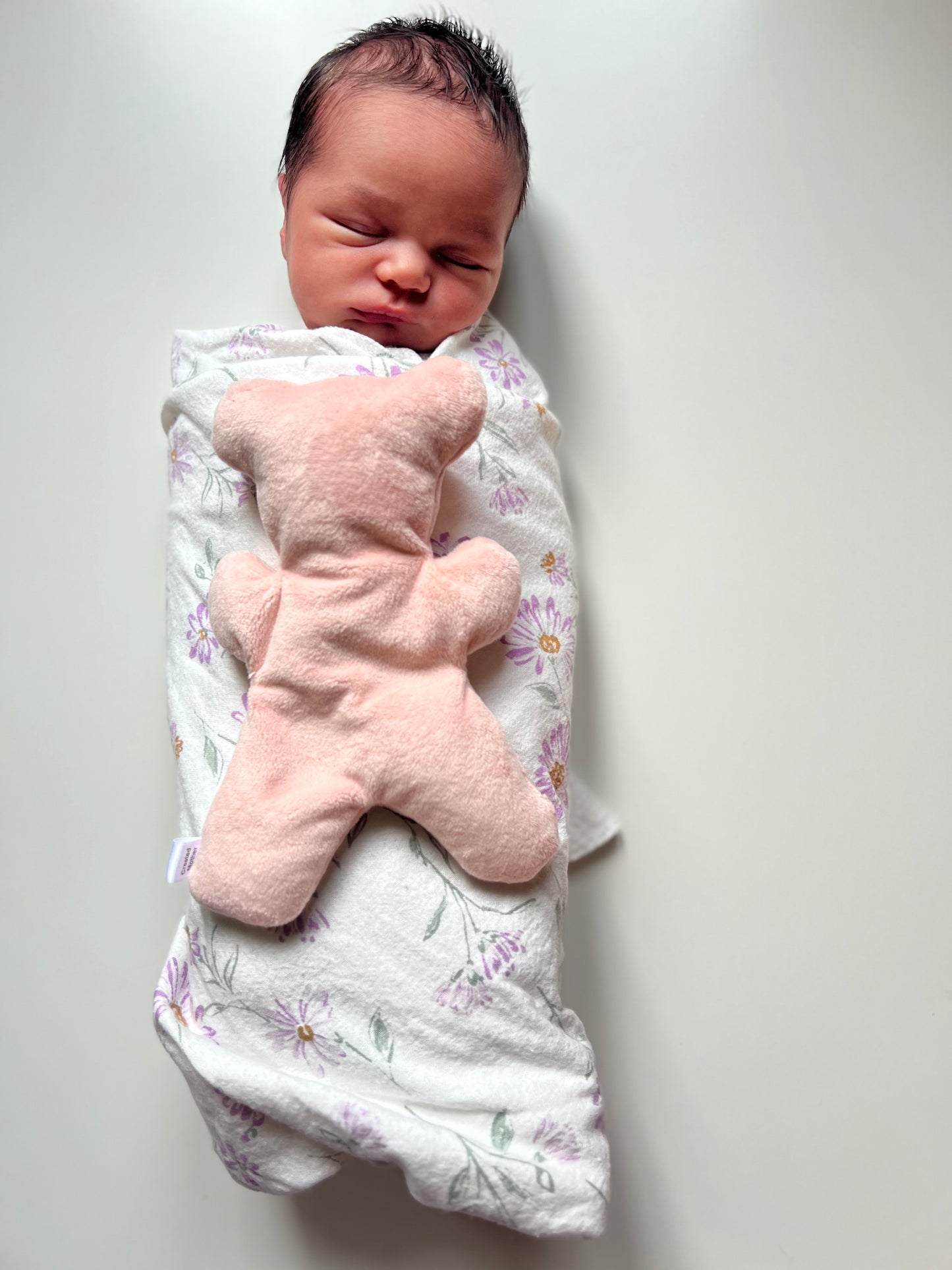Adorable therapy bear for soothing growing pains, colic, and bumps.
