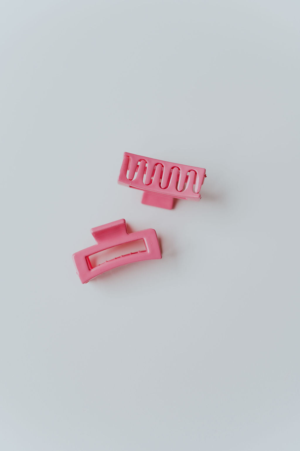 Assorted pastel hair claws, featuring small rectangle designs.