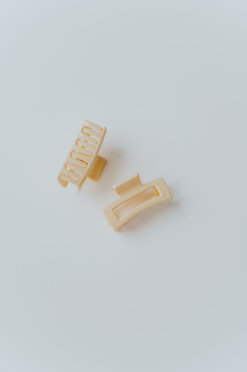 Collection of tiny hair claw clips in gentle pastel hues