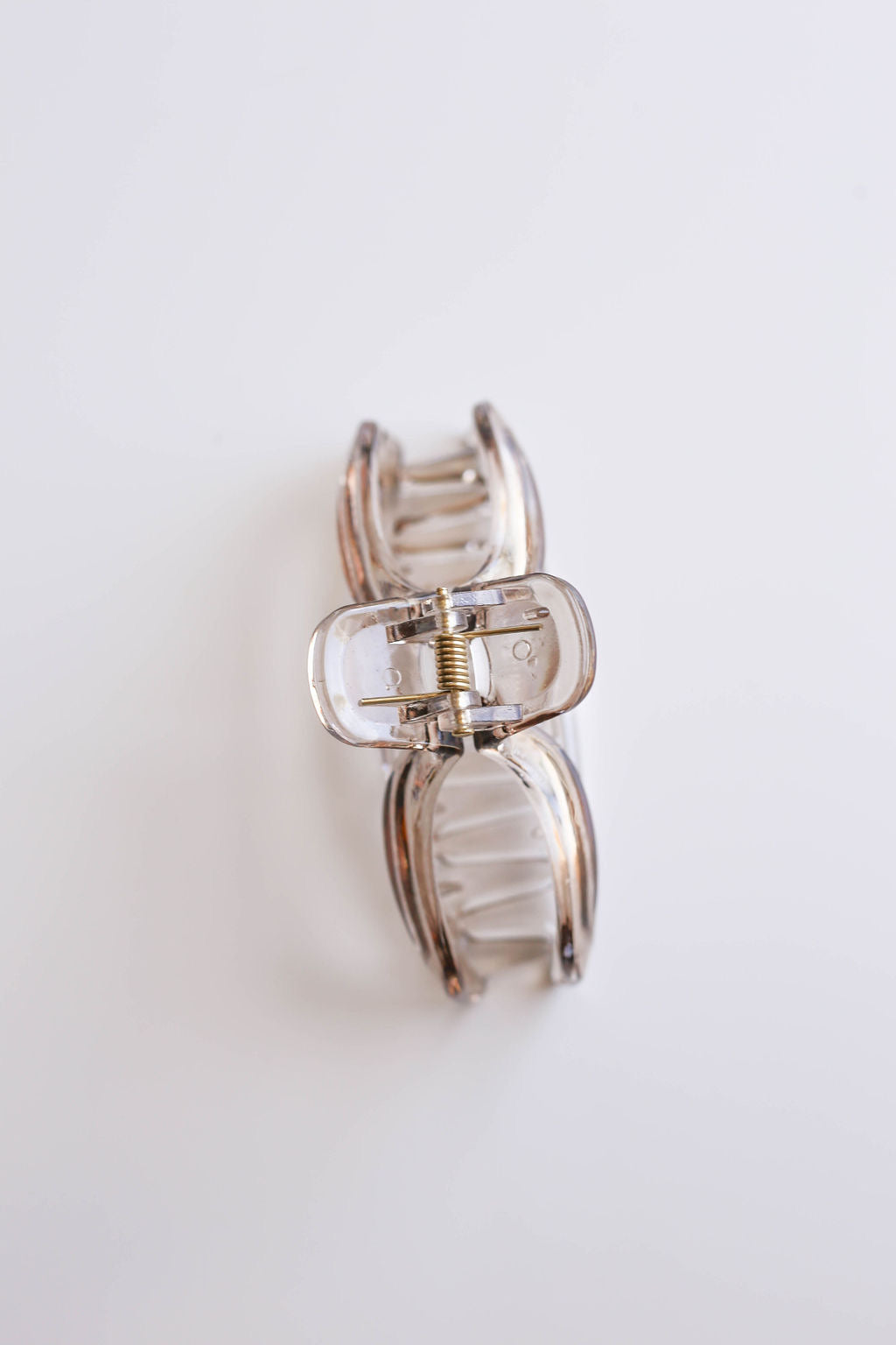 Vibrant and playful patterns in medium hair claw clips to suit every occasion.