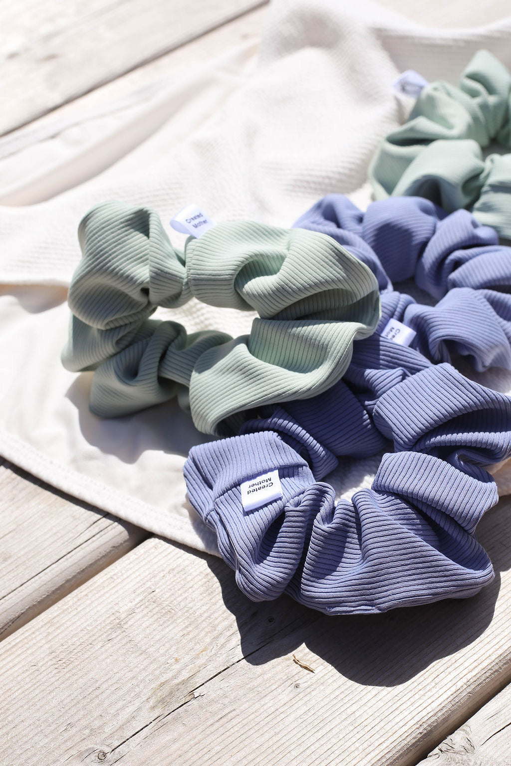 Quick-drying SWIM scrunchie, perfect for pool, beach, or lake adventures.