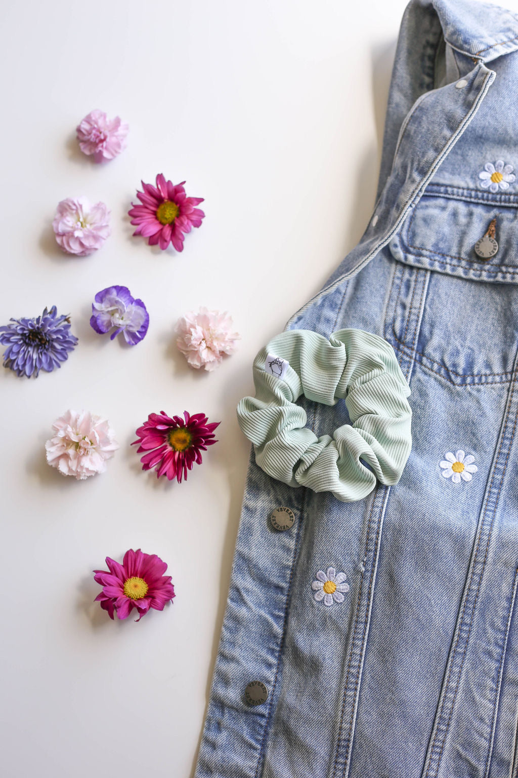 Light sage scrunchie, perfect for transitioning from pool to everyday wear.
