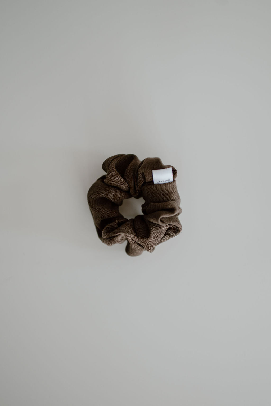 deep brown medium weight scrunchie by created mother