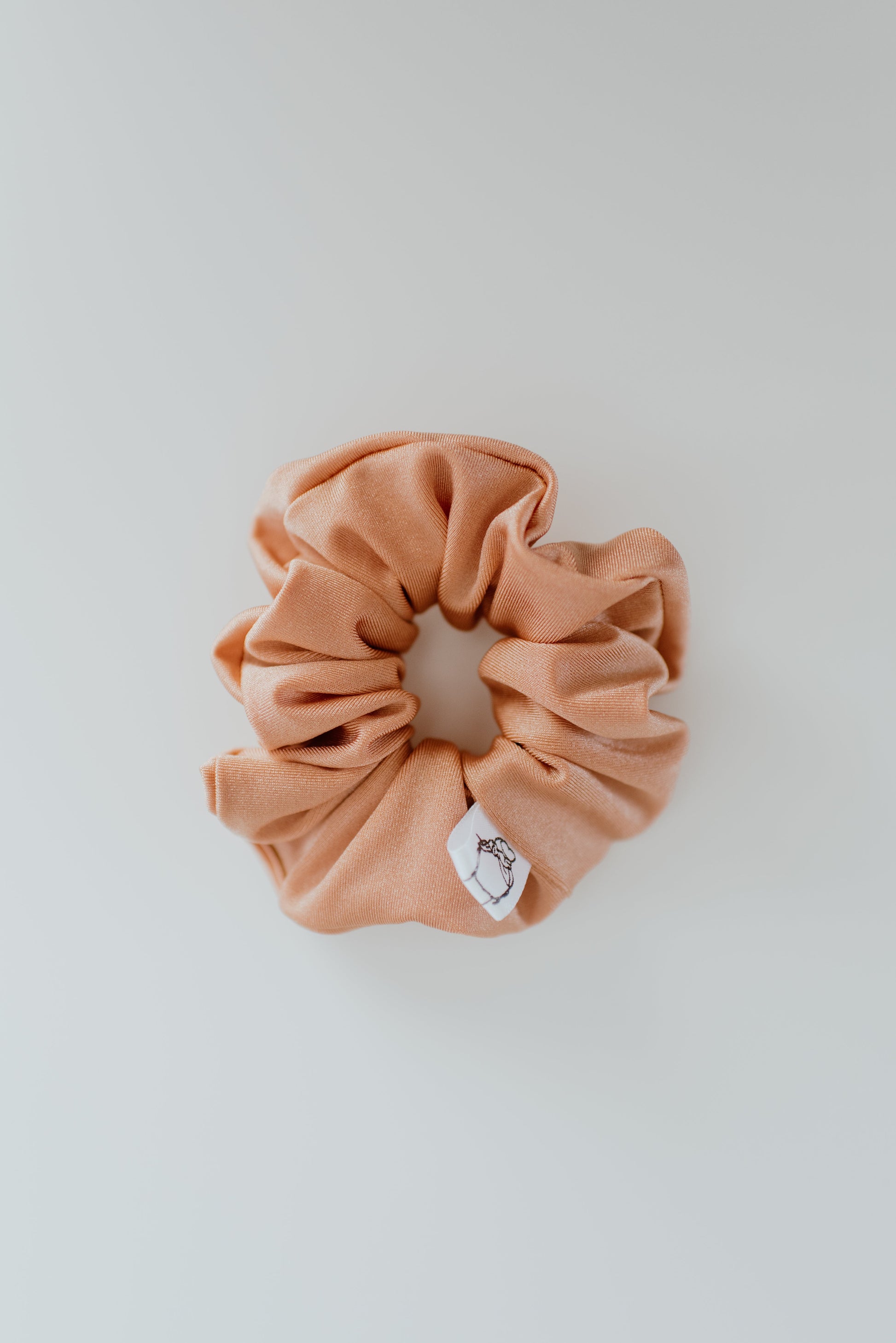 Durable peach swim scrunchie for active outdoor use