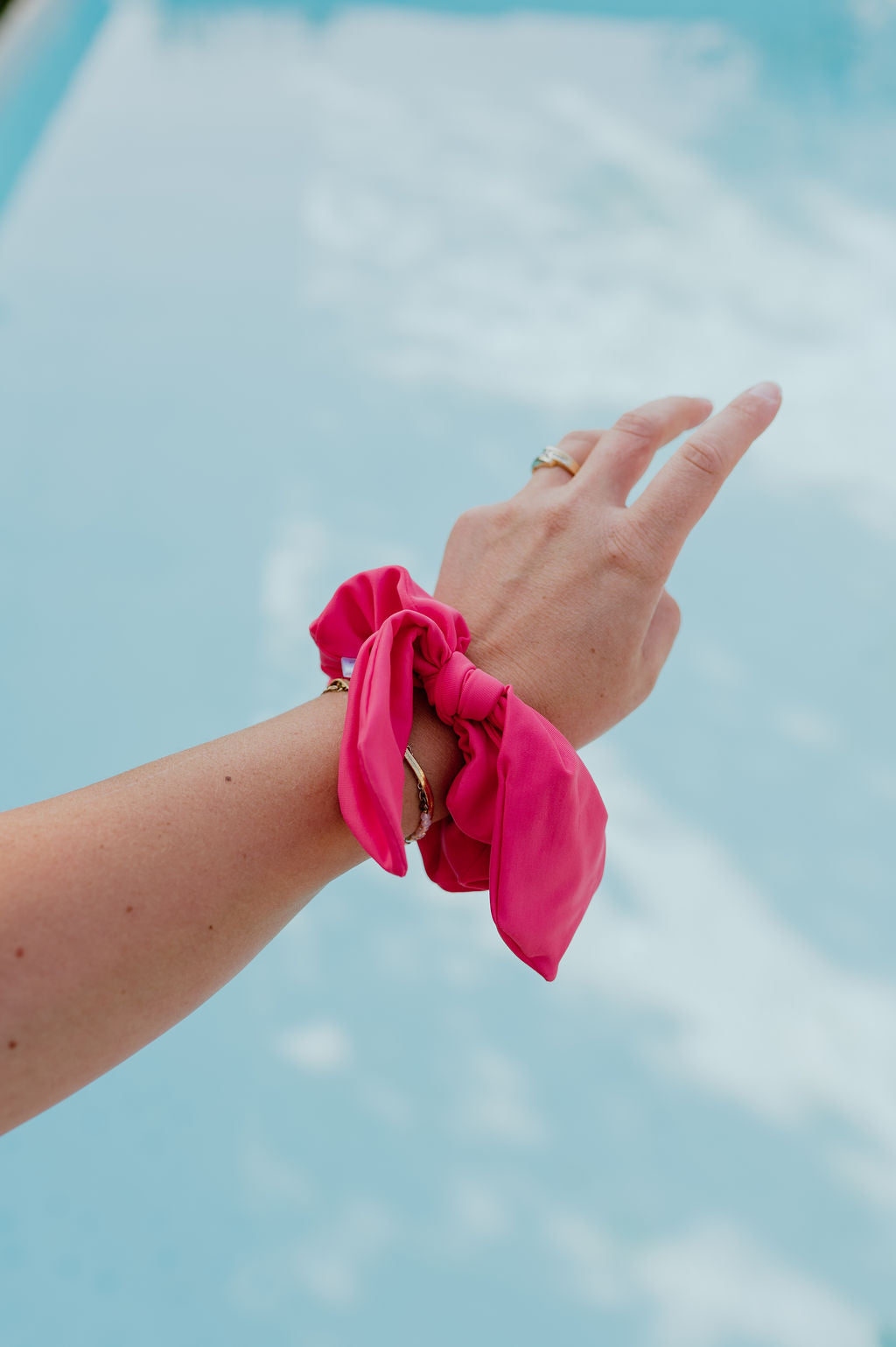 Water-repellent pink swim scrunchie for gym and swim use