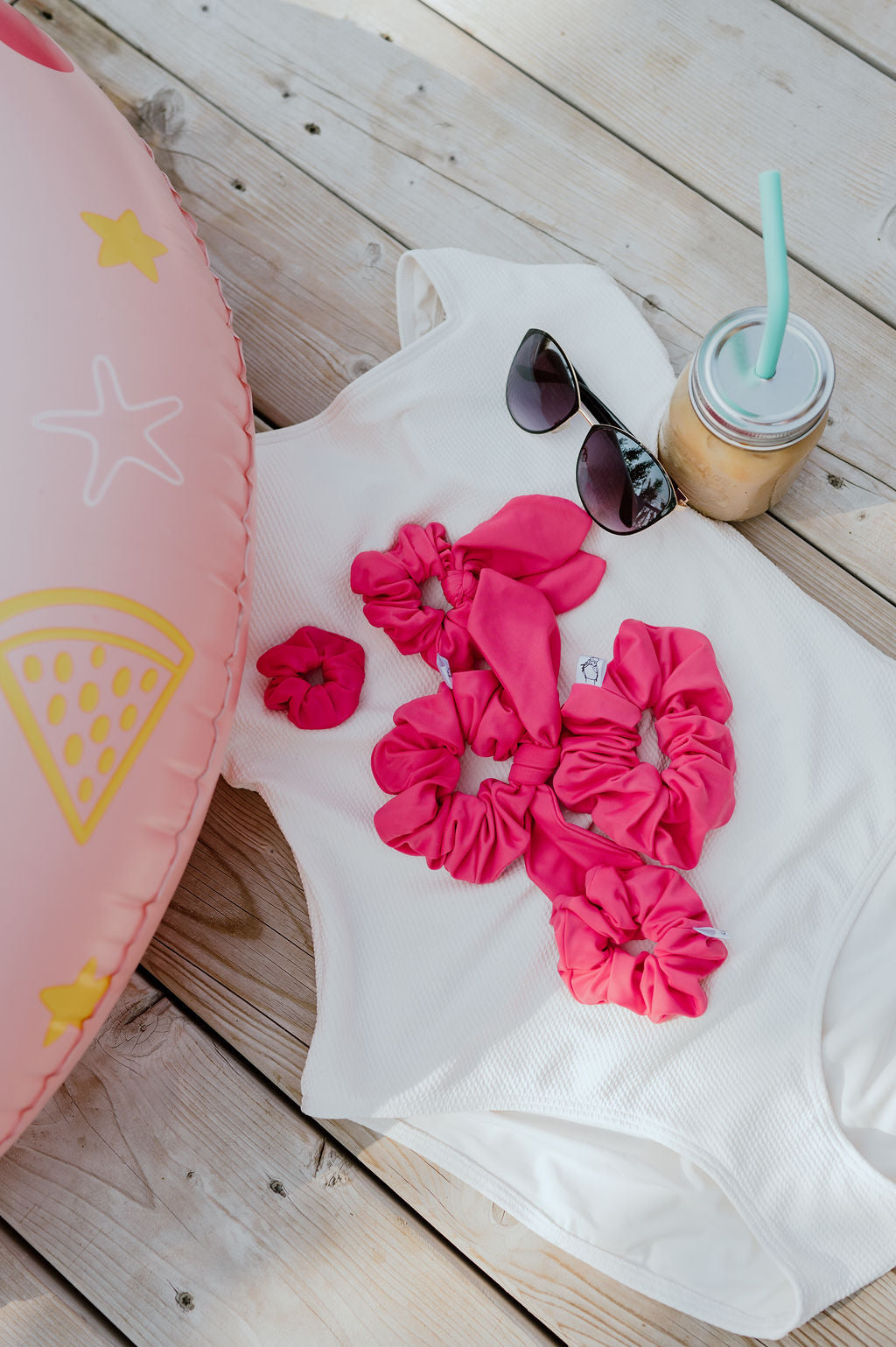 Secure pink swim scrunchie for aquatic and land activities