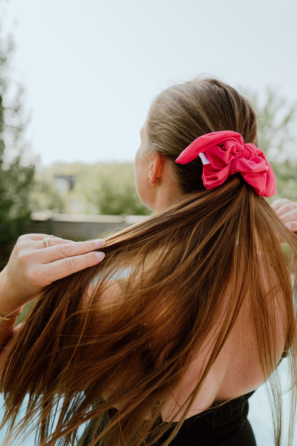 Durable pink swim scrunchie for active lifestyles