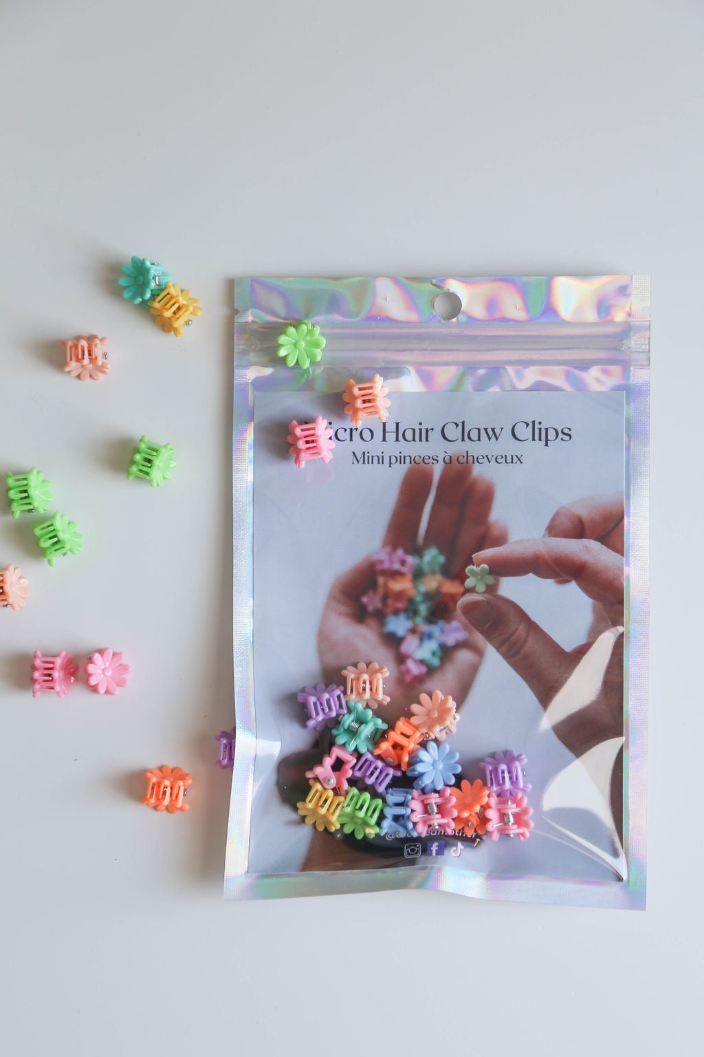Pack of colorful mini claw clips for creating fun and playful hairstyles for little girls
