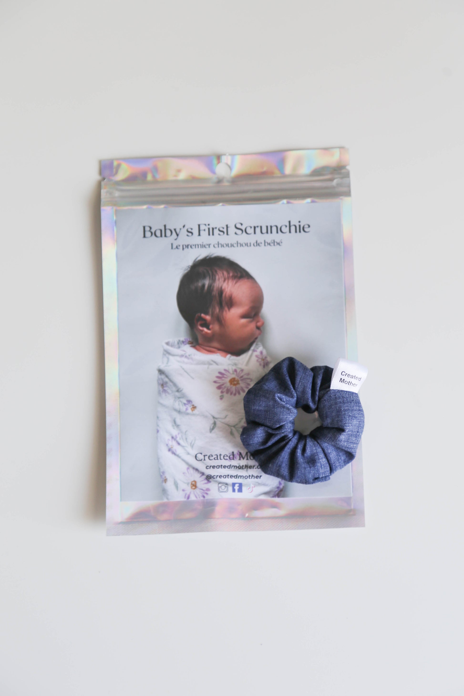 Delicate and colorful, this baby scrunchie is the perfect accessory for fine hair