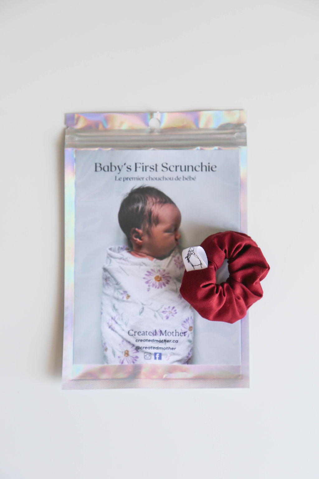 Give the gift of style with this adorable micro scrunchie packaged in a holographic pouch.