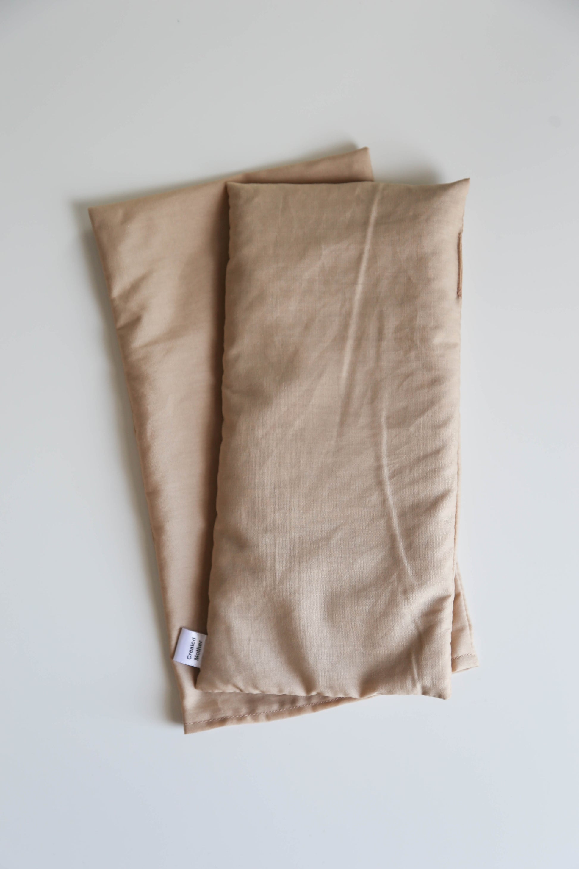Medium-size comfort therapy pack for heat or cold application to soothe aches and tension