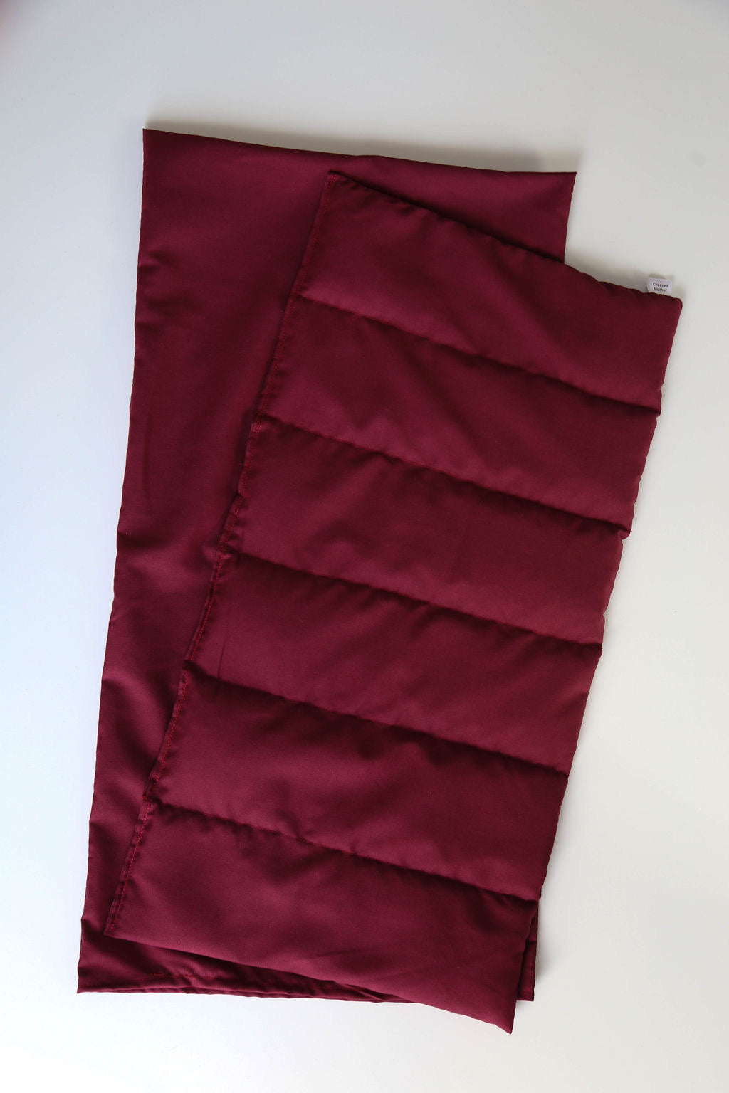 Ruby extra large hot/cold therapy pack with matching cover, perfect for full back or shoulder relief.