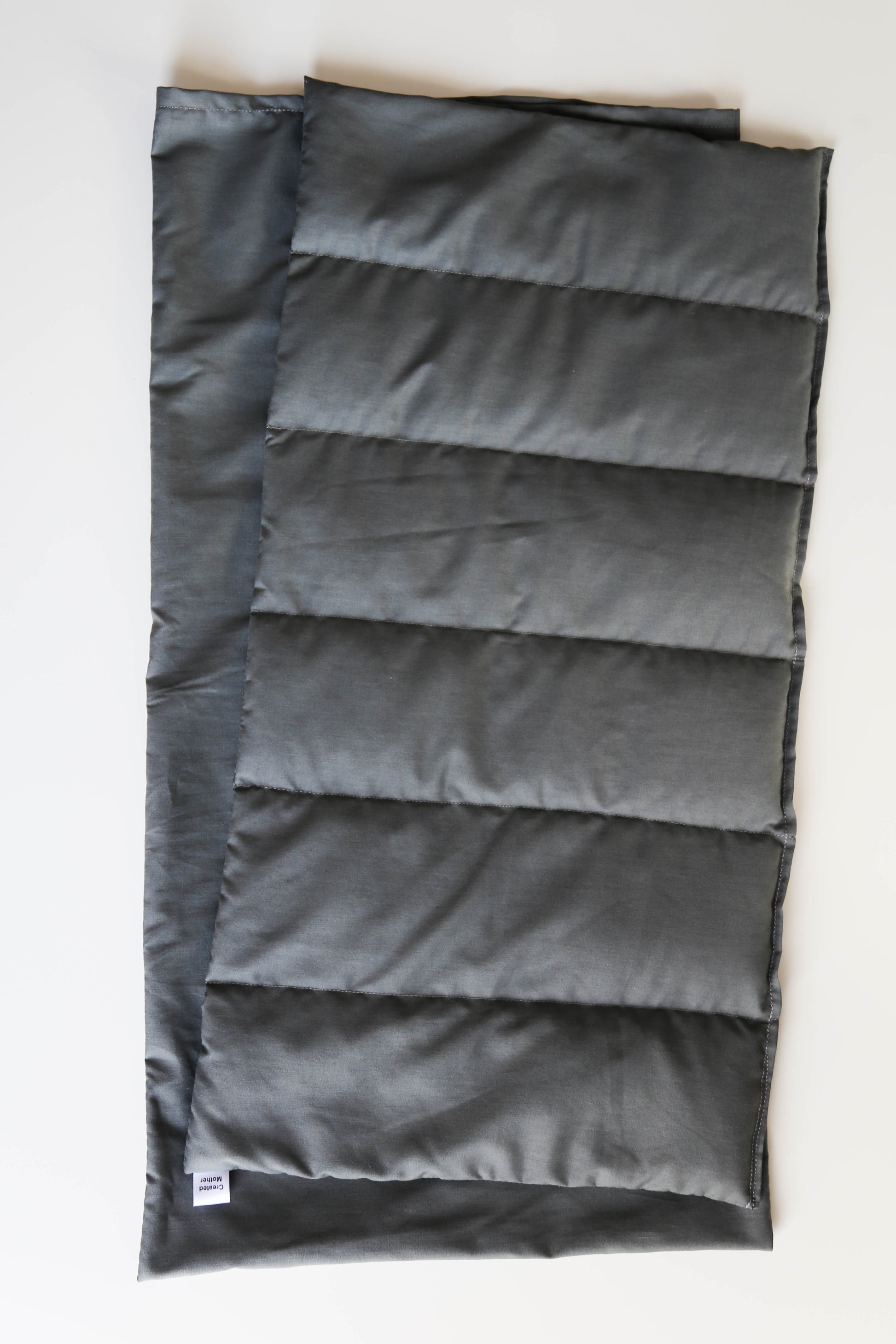 Grey extra large hot/cold pack crafted for adult use, great for tension, injuries, and large muscle areas.