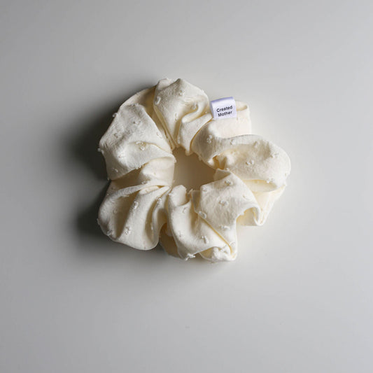 Soft cream scrunchie with embroidered details