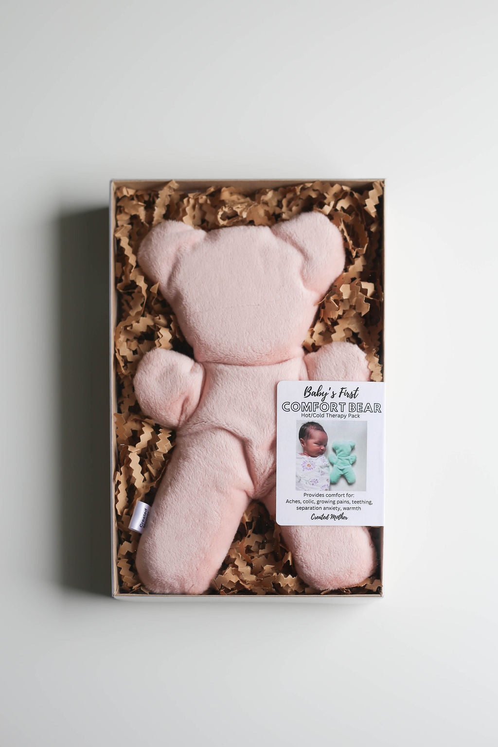 Close-up of the bear therapy pack showing plush texture and kid-friendly design.