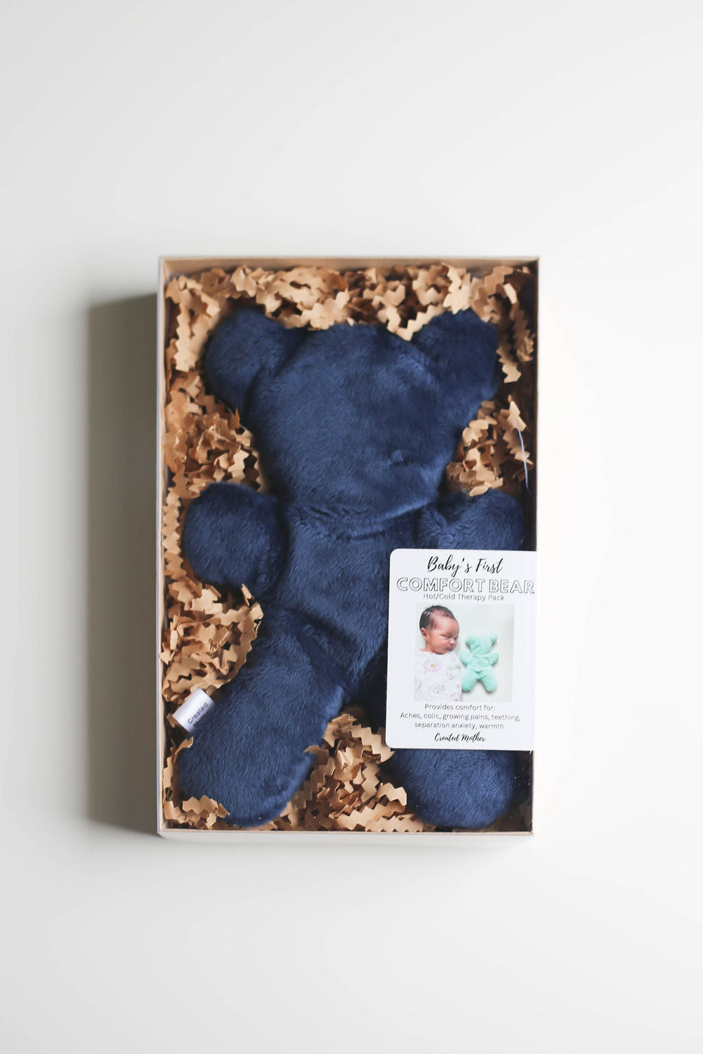 Baby comfort bear therapy pack used for natural pain relief and bedtime relaxation.