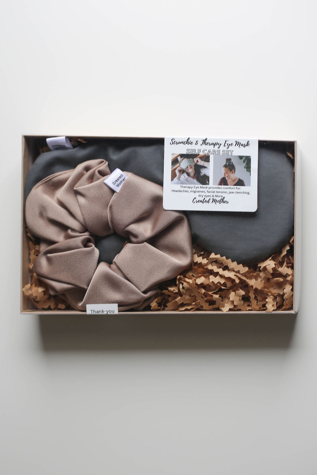 Self-care set featuring a quick-chill or warm eye mask for headaches, with a soft fabric scrunchie.