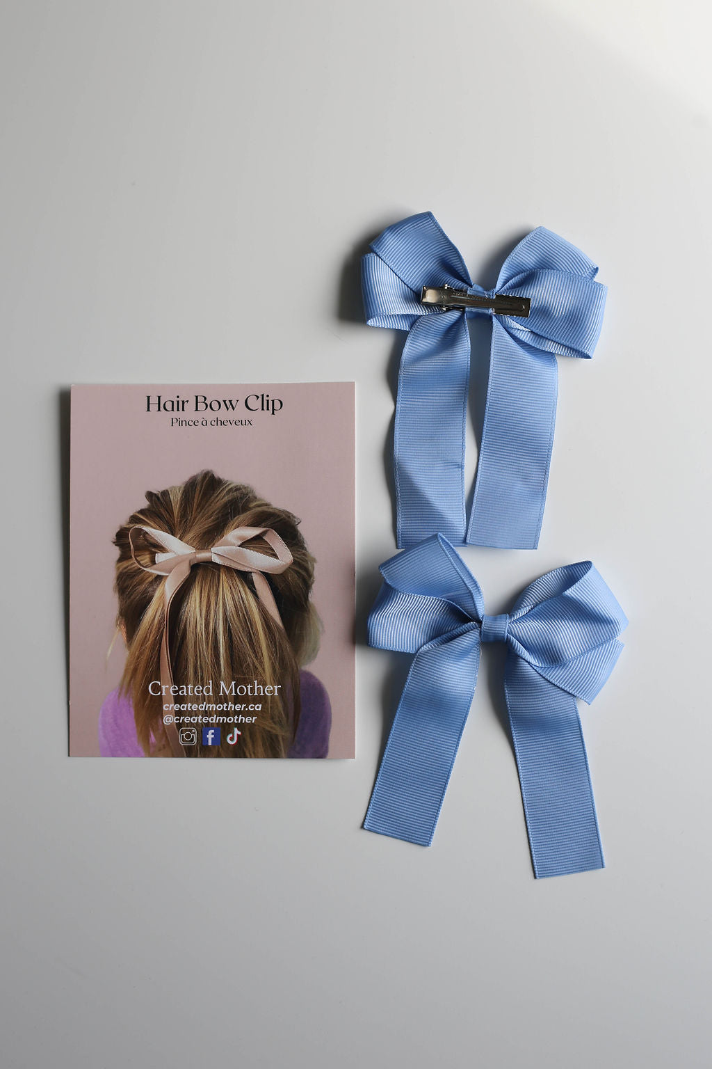 Elegant hair bow clip in classic blue, ideal for weddings, parties, or everyday wear.