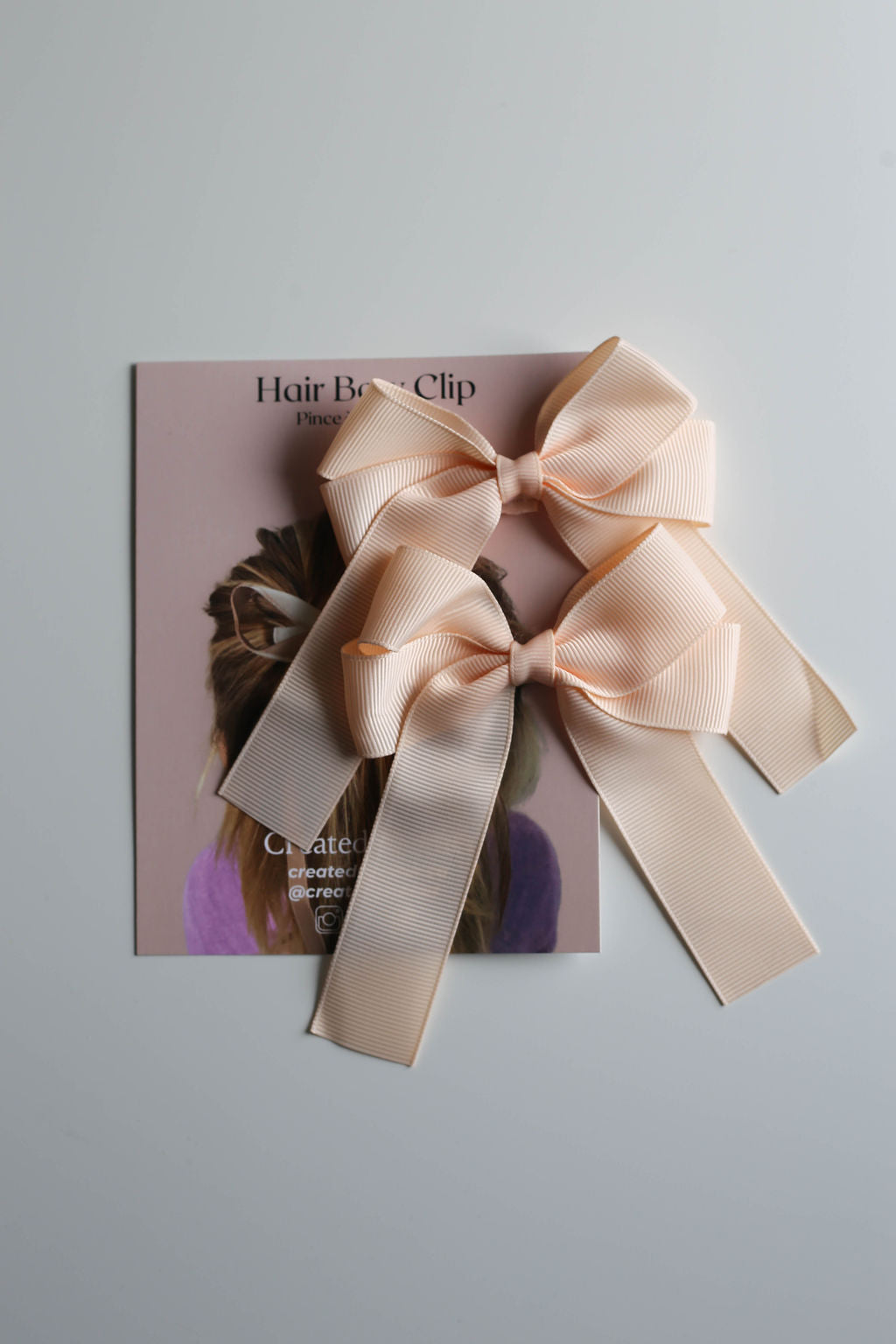 Premium ribbon bow clip collection with color variety options available individually.