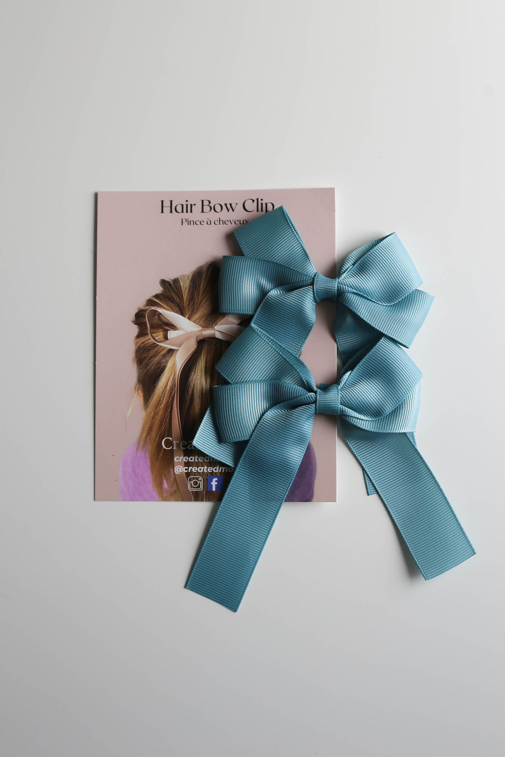 Hair bow clip on branded packaging card, ready for gifting or boutique display.