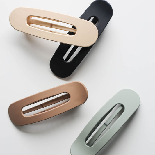 Low-profile neutral claw clip ideal for driving, lounging, or yoga