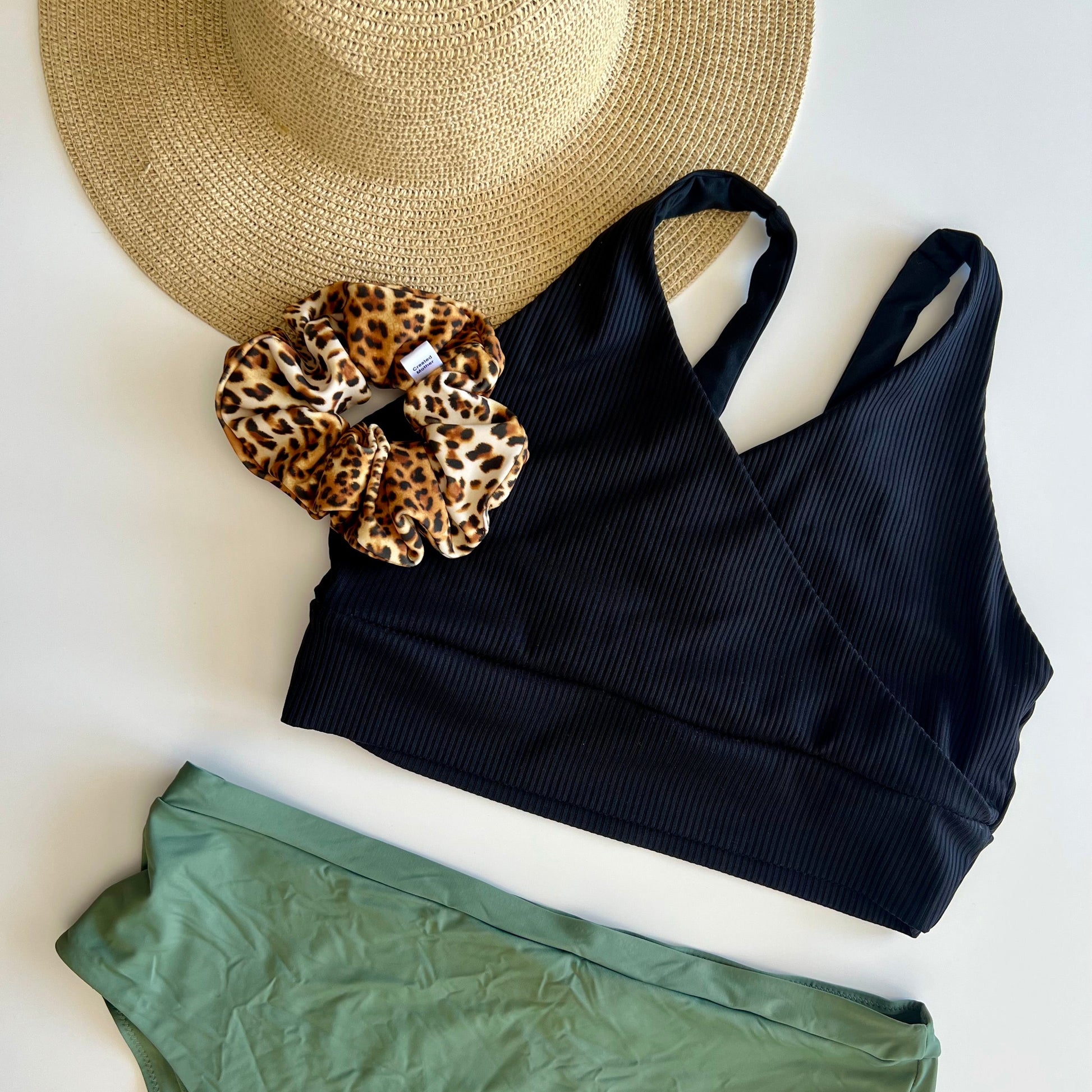 Leopard print swim scrunchie made from swimsuit fabric