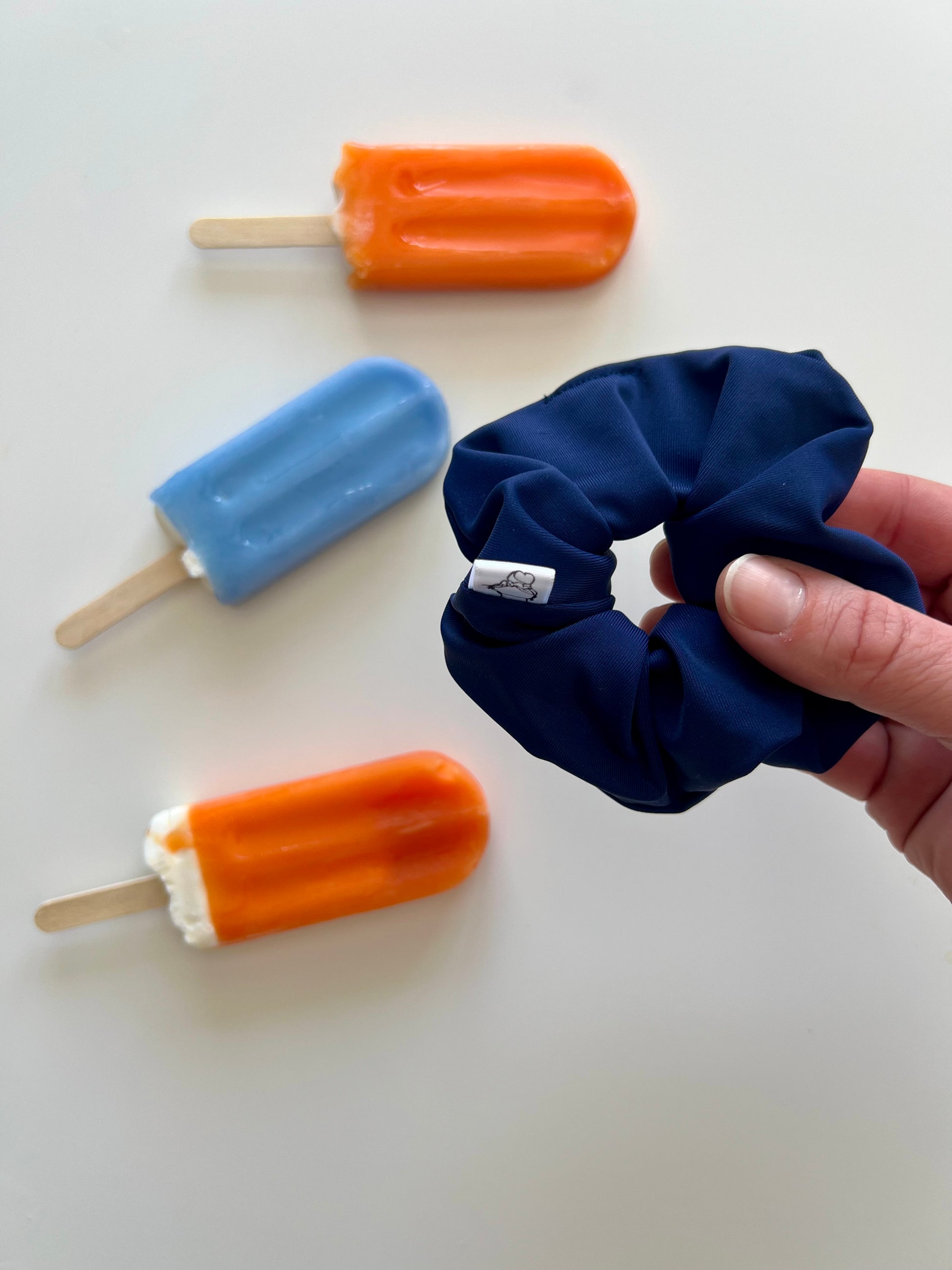 Navy athletic scrunchie for paddleboarding and boating