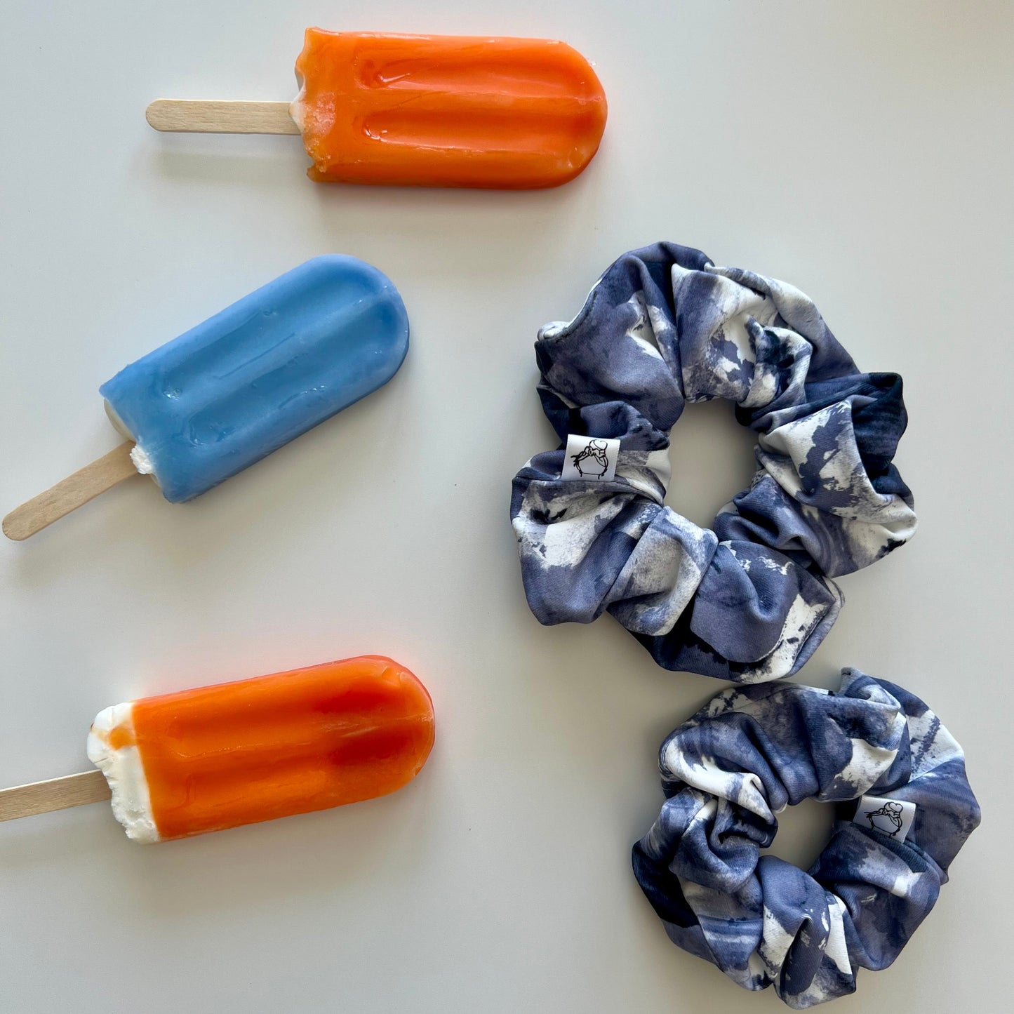 Watercolour print swim scrunchie made from swimsuit fabric