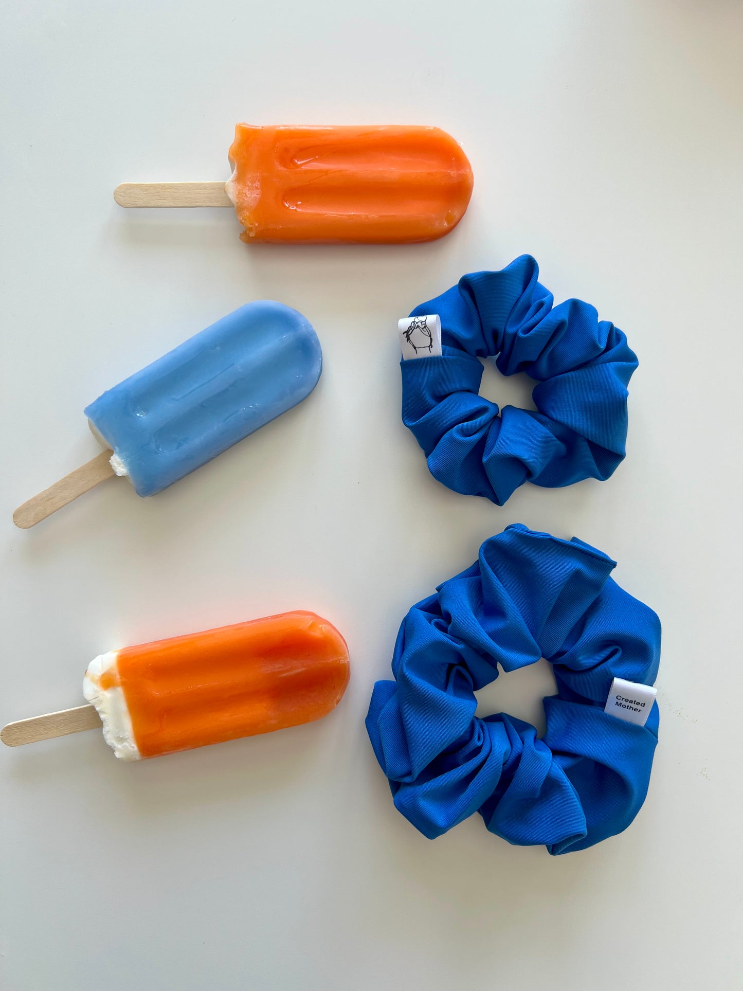 Blue swimsuit scrunchie for swimming and pool days