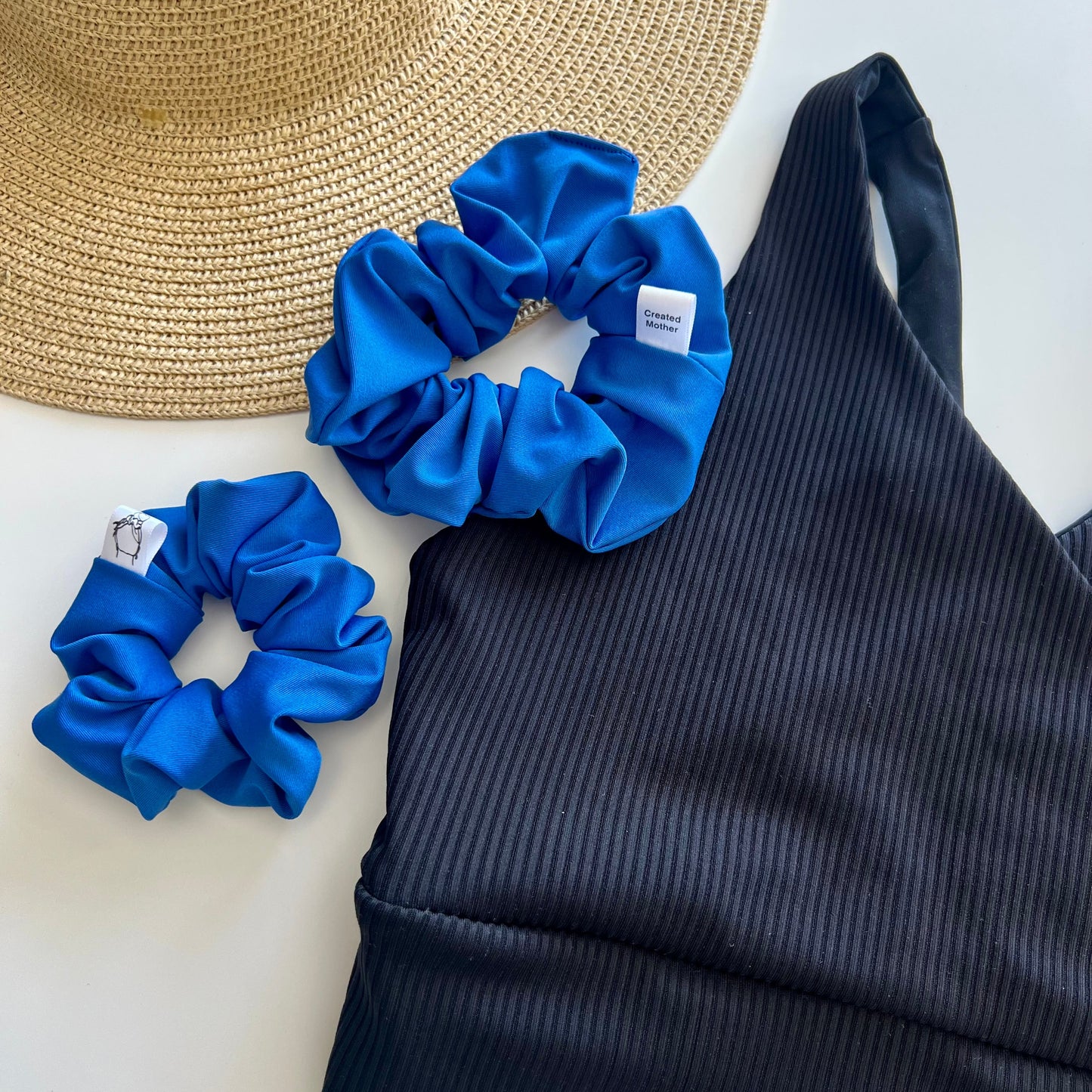 Bright blue swim scrunchie made from quick dry fabric