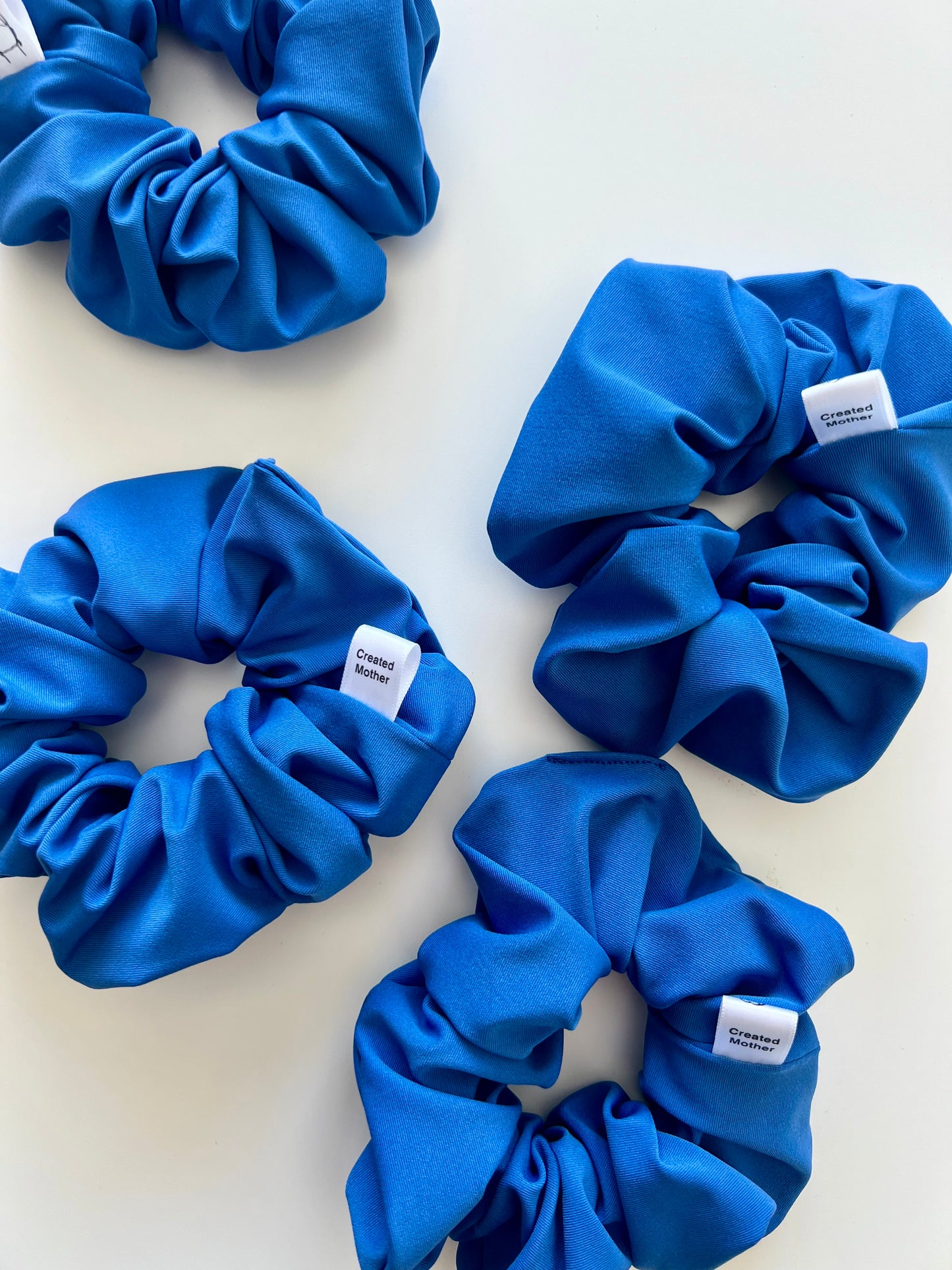 Blue water resistant scrunchie for beach trips