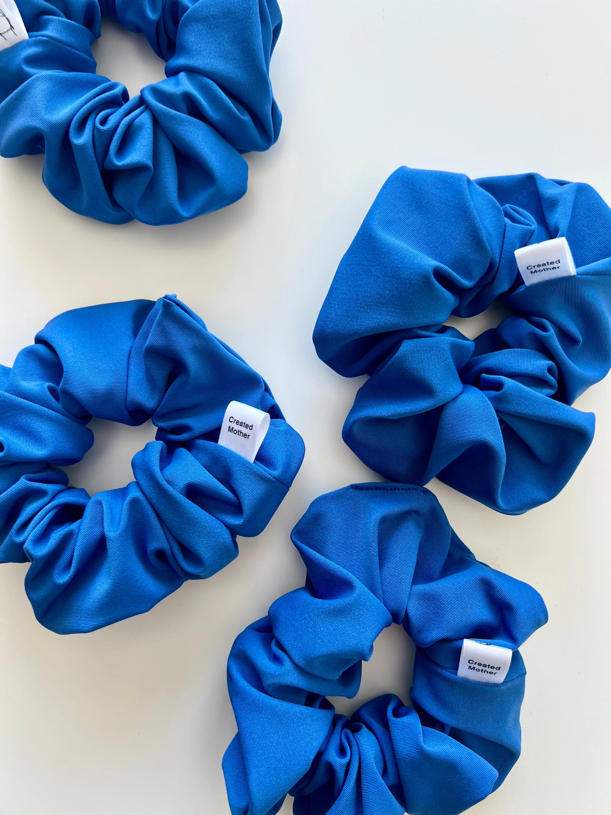 Blue water resistant scrunchie for beach trips