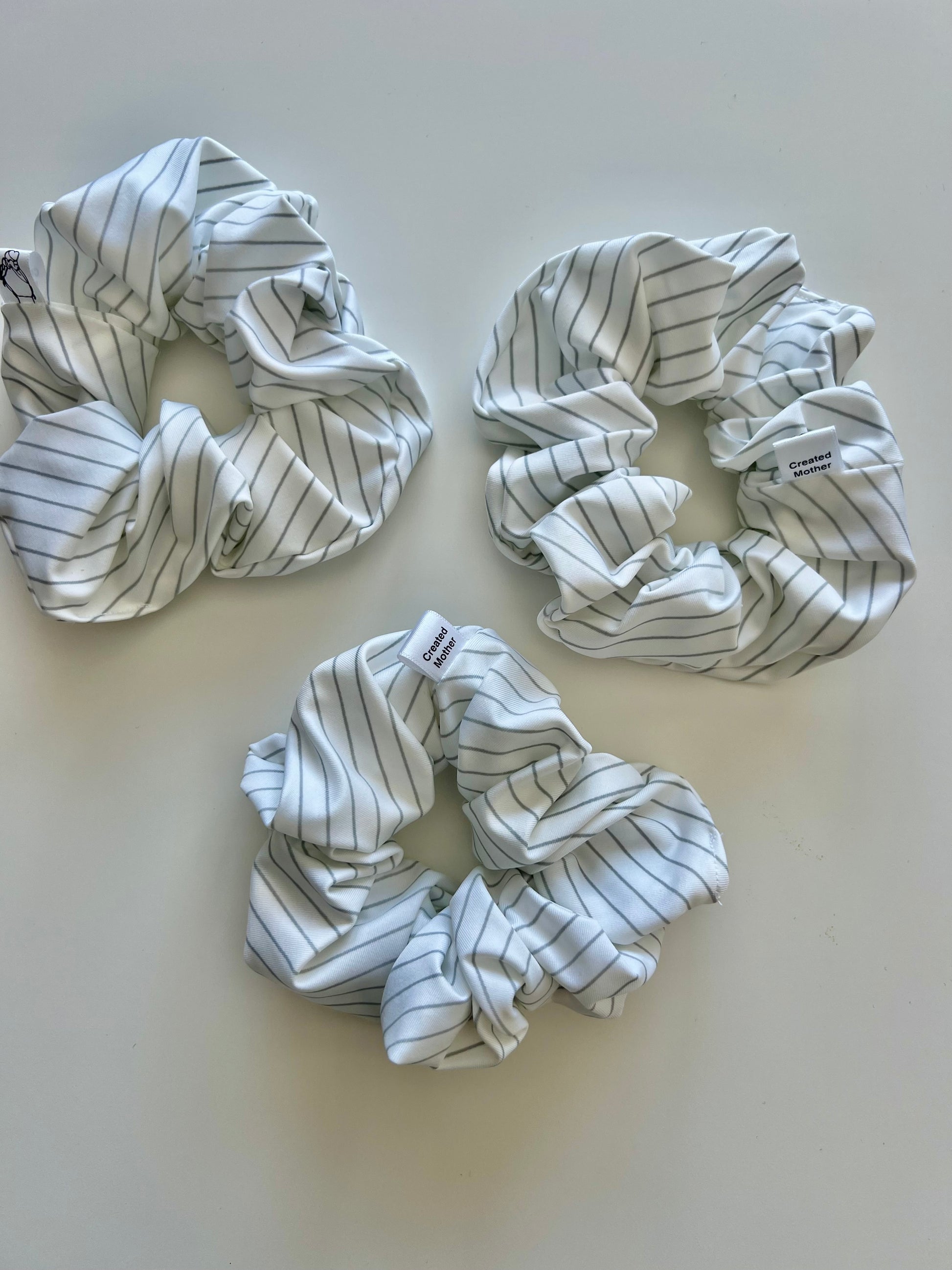 Large scrunchies made of swimsuit material for summer adventures