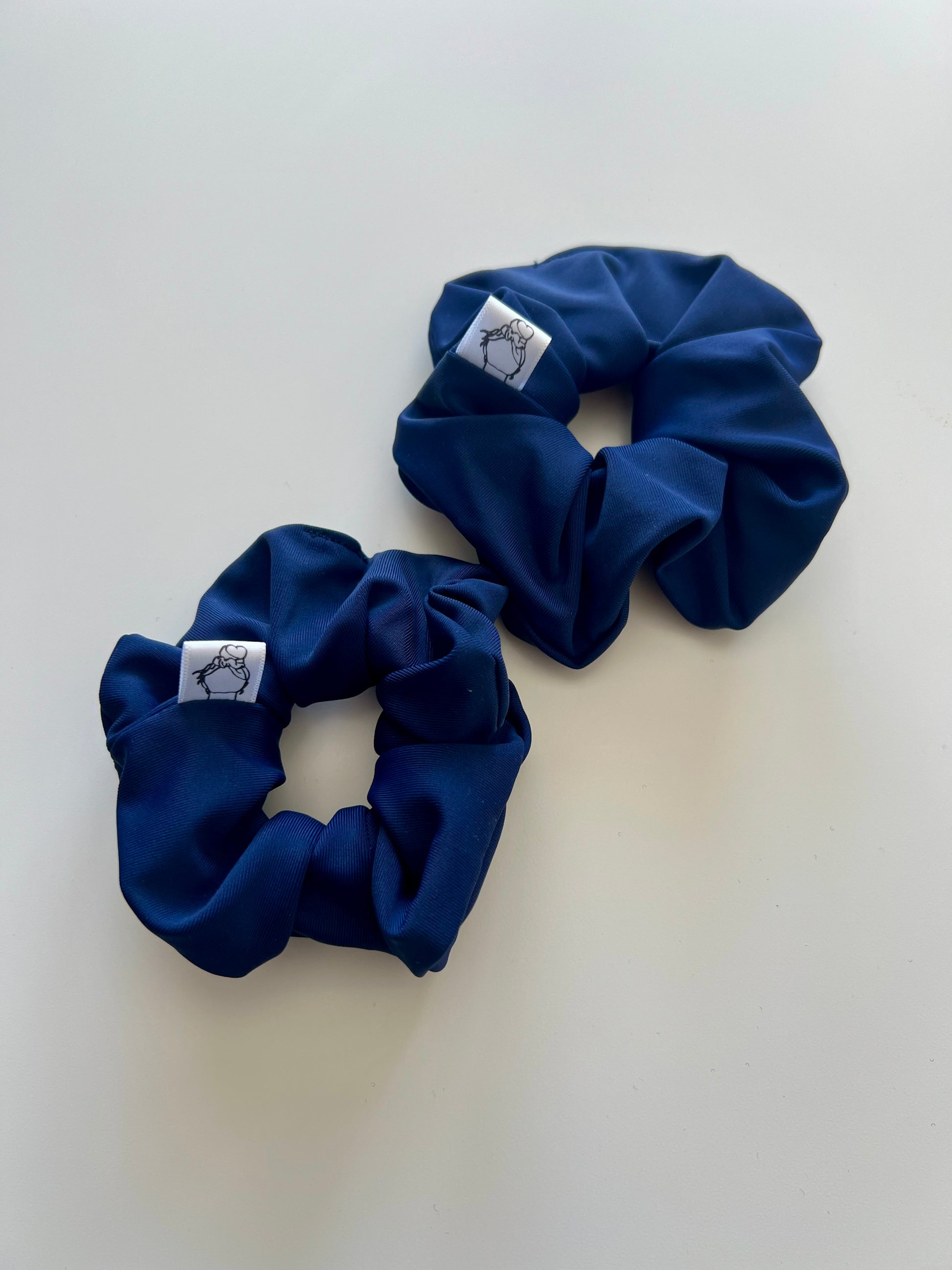 Navy blue sporty scrunchie for swimming and kayaking