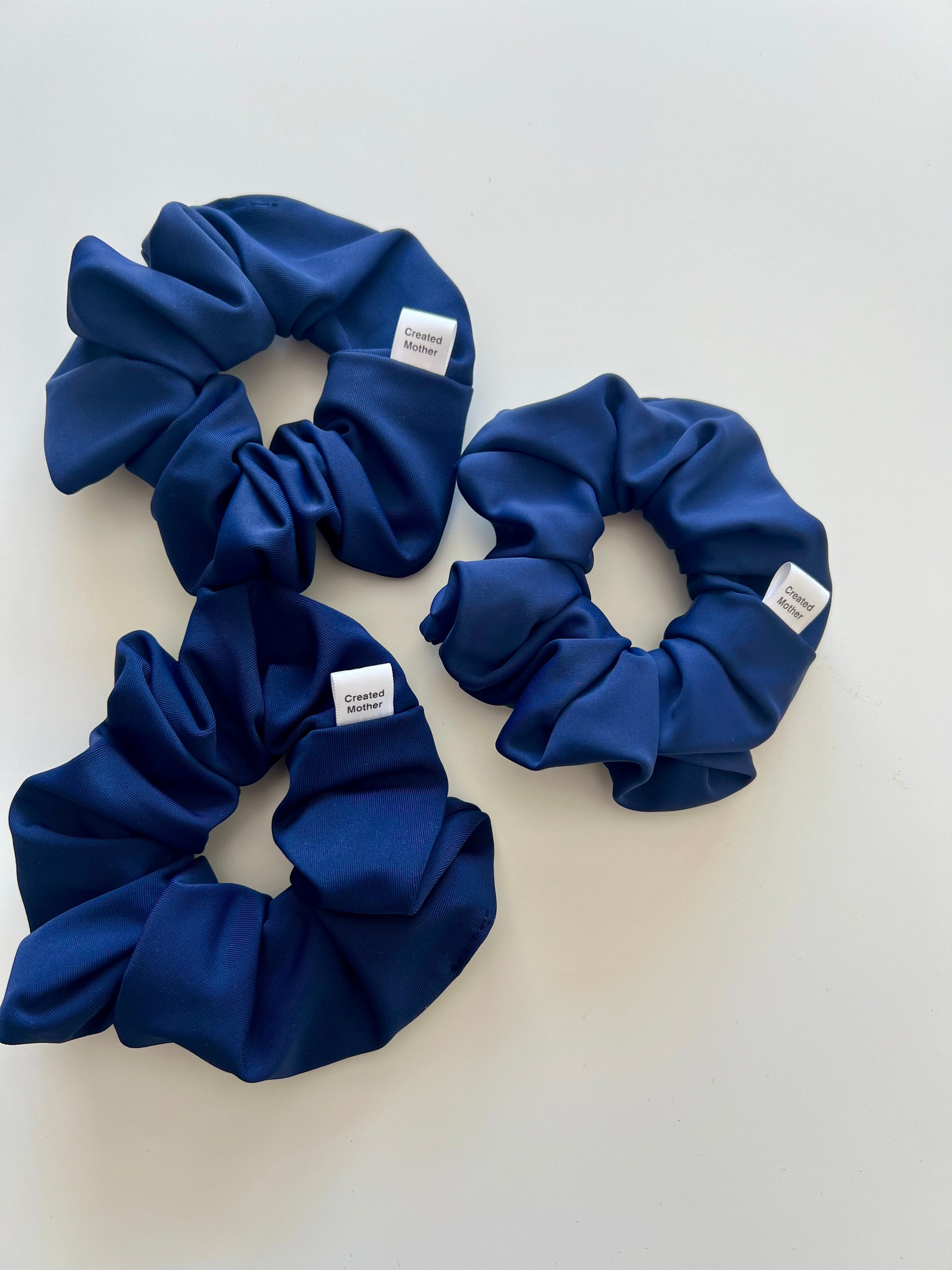 Navy water resistant scrunchie for hiking to lake dips