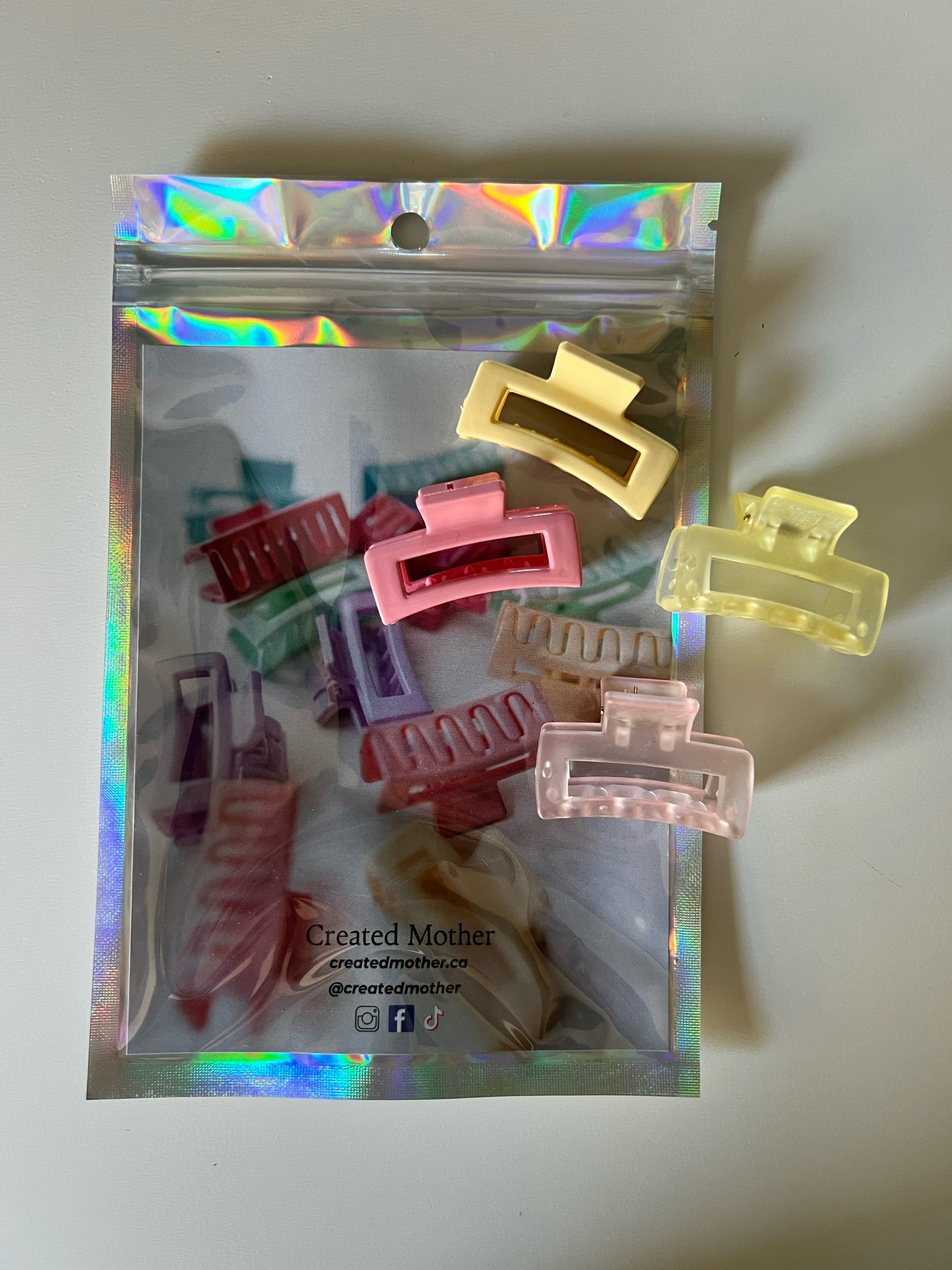 Delicate pastel colors of the micro hair claw clips, showcasing their whimsical and stylish design.